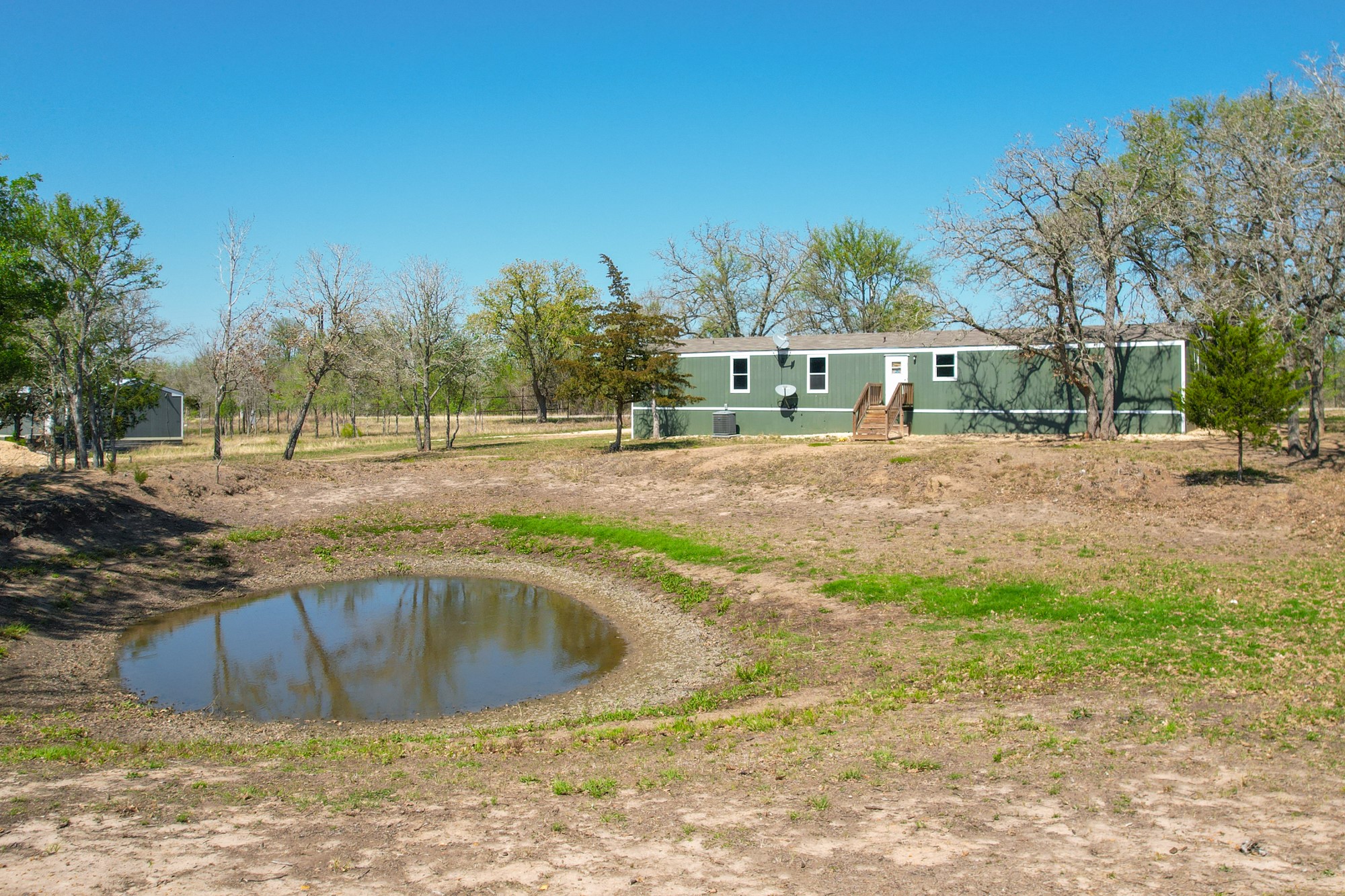 6739 Taylorsville Road Dale, TX 78616 - Photo 4 of 37 a view of a house with a yard