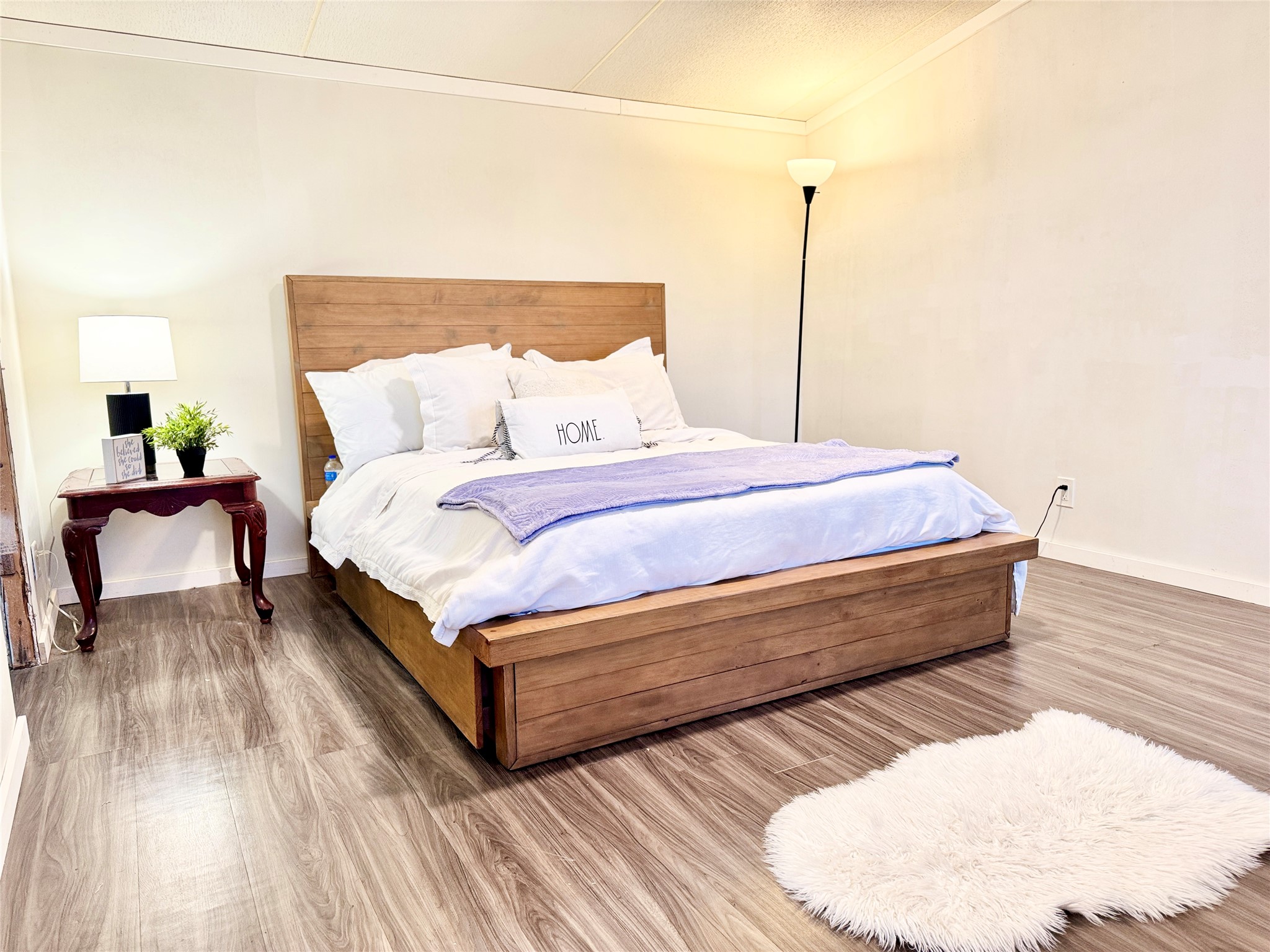 6739 Taylorsville Road Dale, TX 78616 - Photo 5 of 37 a bed room with a bed and a chair