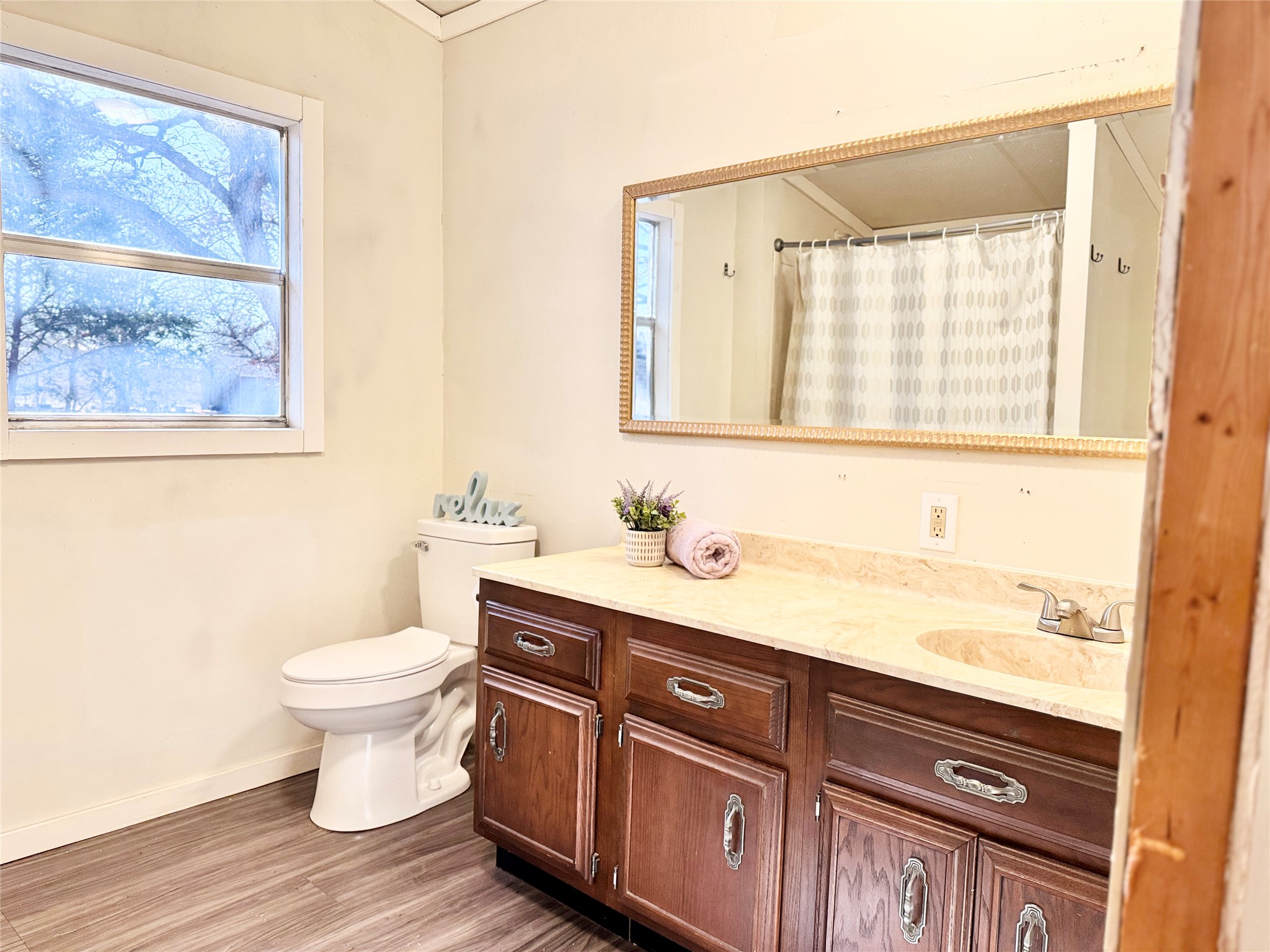 6739 Taylorsville Road Dale, TX 78616 - Photo 6 of 37 a bathroom with a sink and a toilet