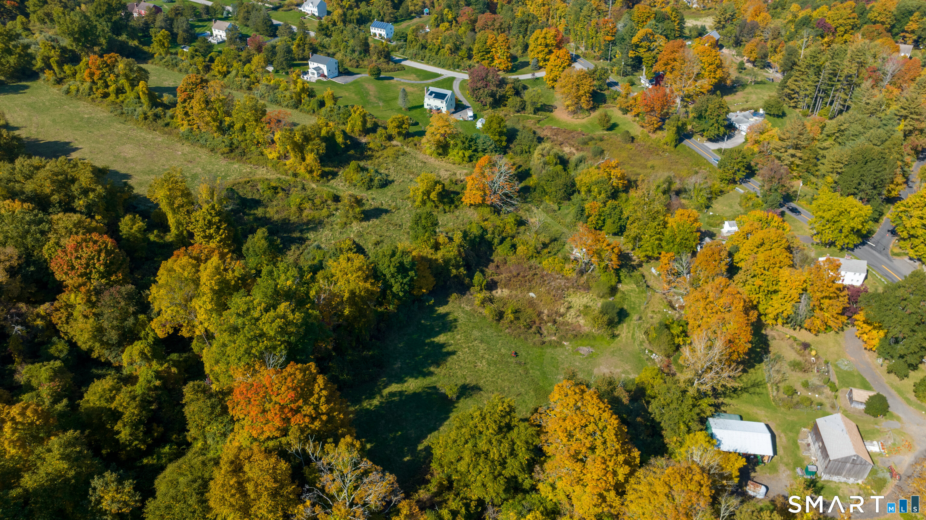 63 Currituck Road Newtown, CT 06470 - Photo 1 of 10 a view of a big yard