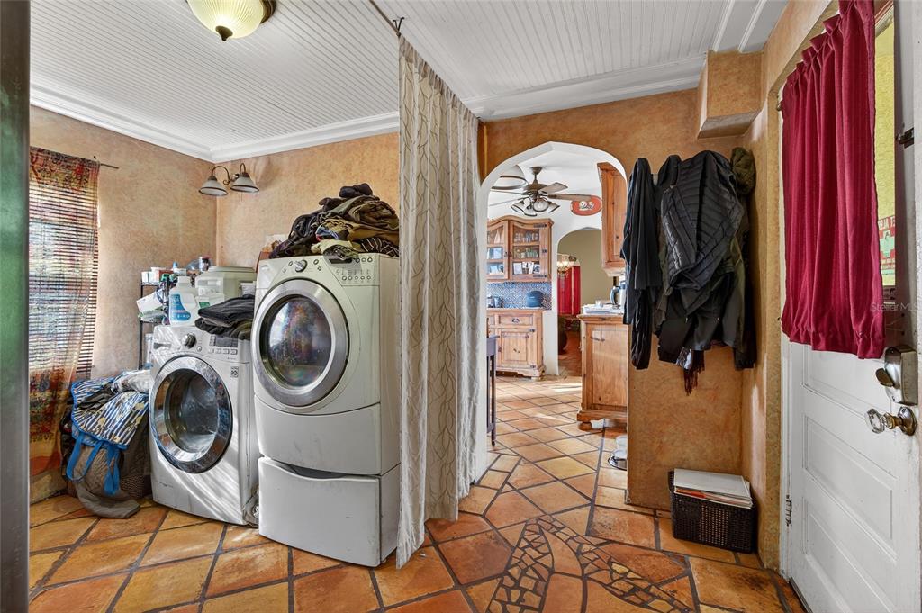 1321 28th Street North St. Petersburg, FL 33713 - Photo 18 of 21 a view of walk in closet with clothes and shoes