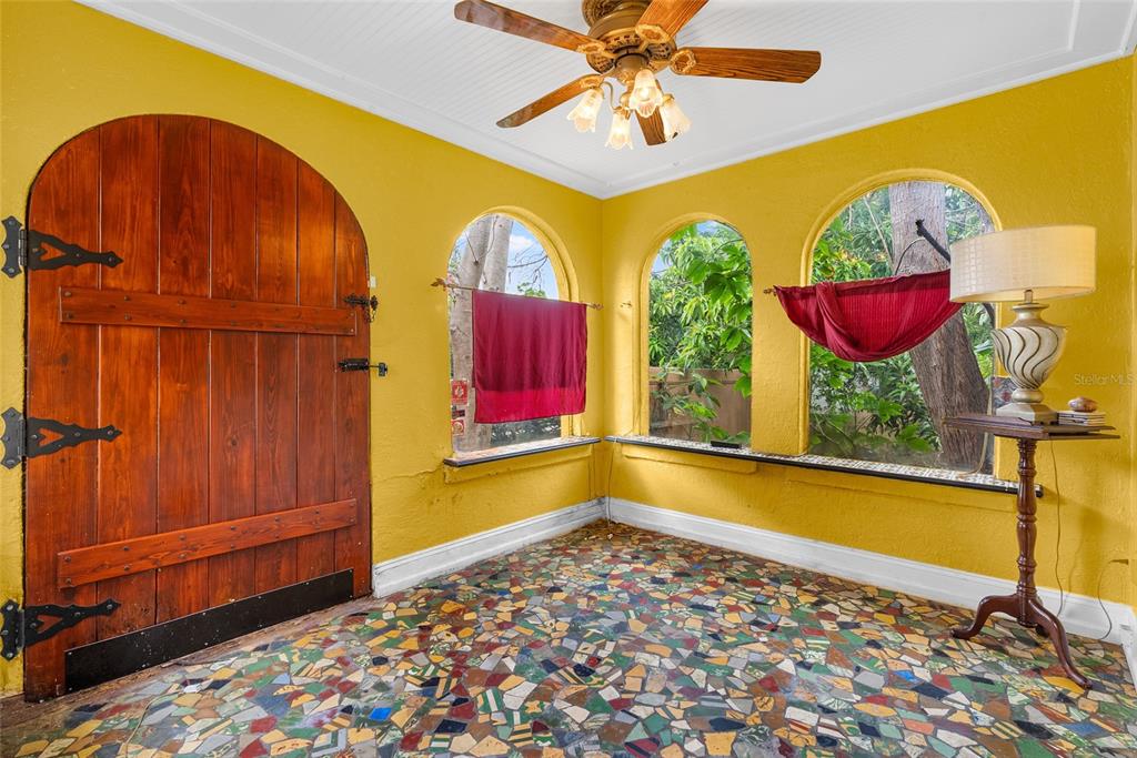 1321 28th Street North St. Petersburg, FL 33713 - Photo 4 of 31 a view of a room with window and a potted plant