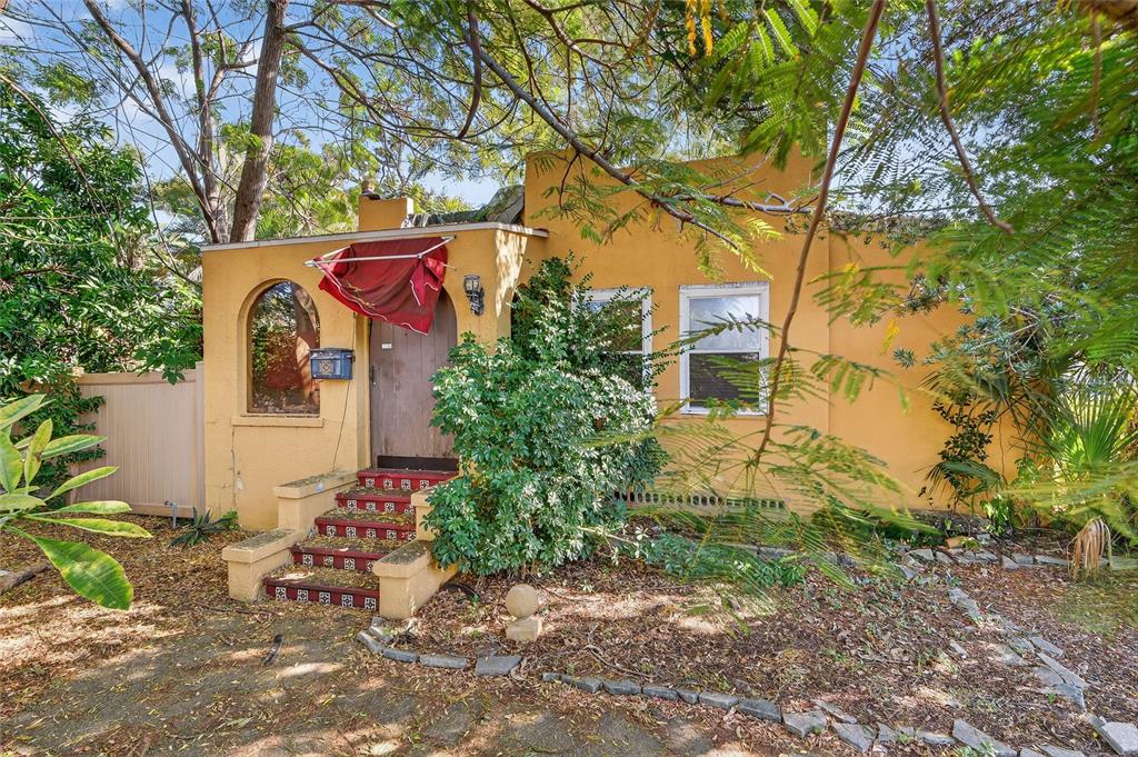 1321 28th Street North St. Petersburg, FL 33713 - Photo 5 of 21 front view of a house with a trees