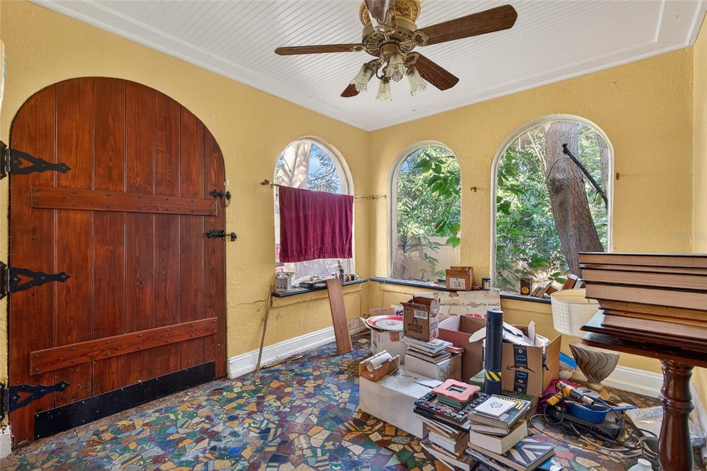 1321 28th Street North St. Petersburg, FL 33713 - Photo 6 of 21 a living room with furniture and a large window