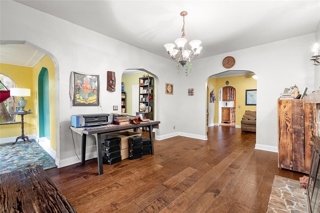 1321 28th Street North St. Petersburg, FL 33713 - Photo 6 of 31 a view of a livingroom with furniture wooden floor a chandelier and a window