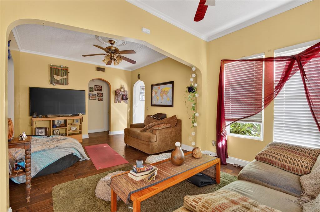 1321 28th Street North St. Petersburg, FL 33713 - Photo 7 of 21 a living room with furniture and a flat screen tv