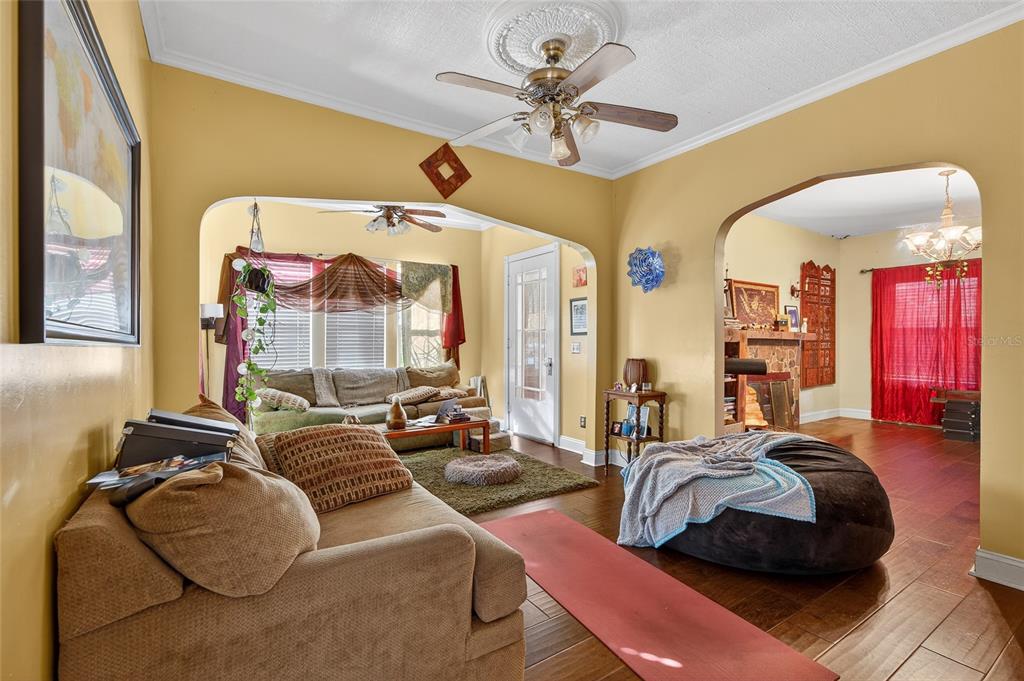 1321 28th Street North St. Petersburg, FL 33713 - Photo 8 of 21 a bed room with furniture and a chandelier