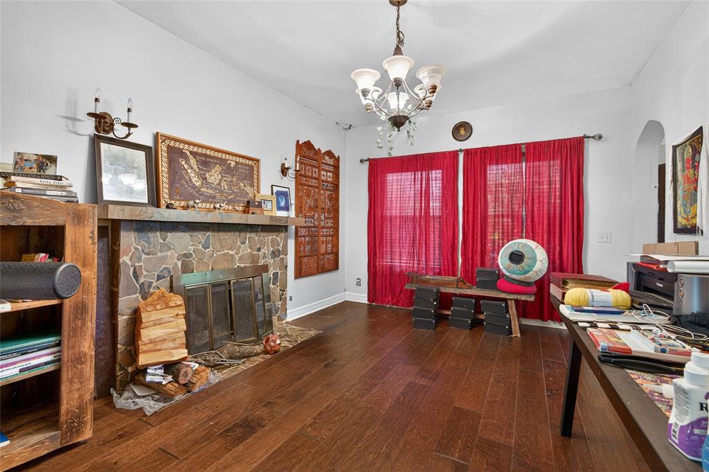 1321 28th Street North St. Petersburg, FL 33713 - Photo 9 of 21 a living room with furniture and a fireplace