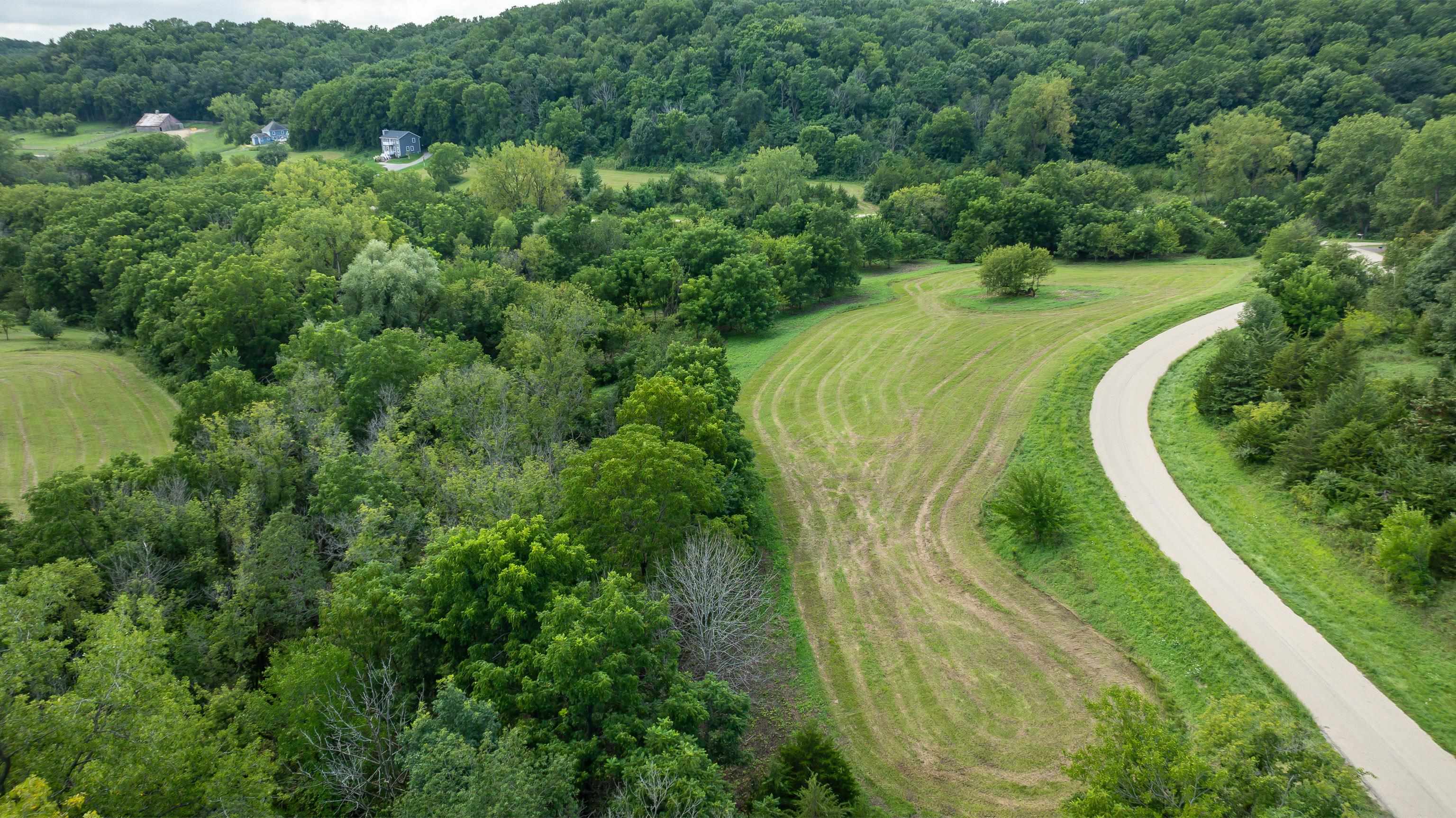 40 Heatherdowns Lane Galena, IL 61036 - Photo 7 of 13 a view of a yard with a swimming pool