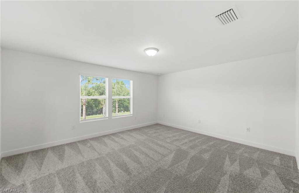 15827 Northridge Road Punta Gorda, FL 33982 - Photo 14 of 27 an empty room with a window