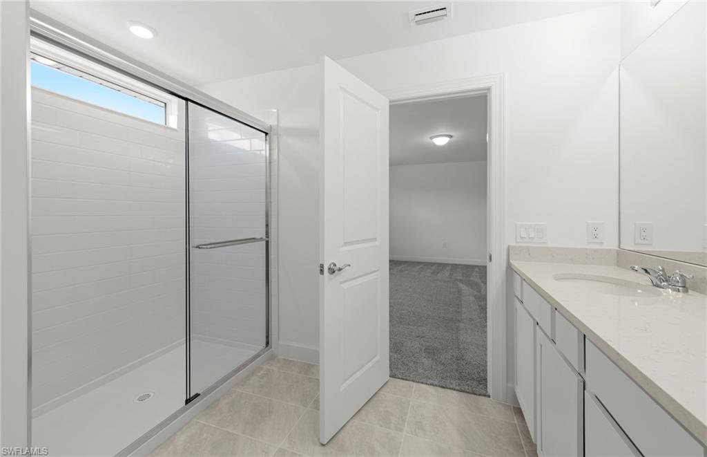 15827 Northridge Road Punta Gorda, FL 33982 - Photo 17 of 27 a bathroom with a shower and a sink