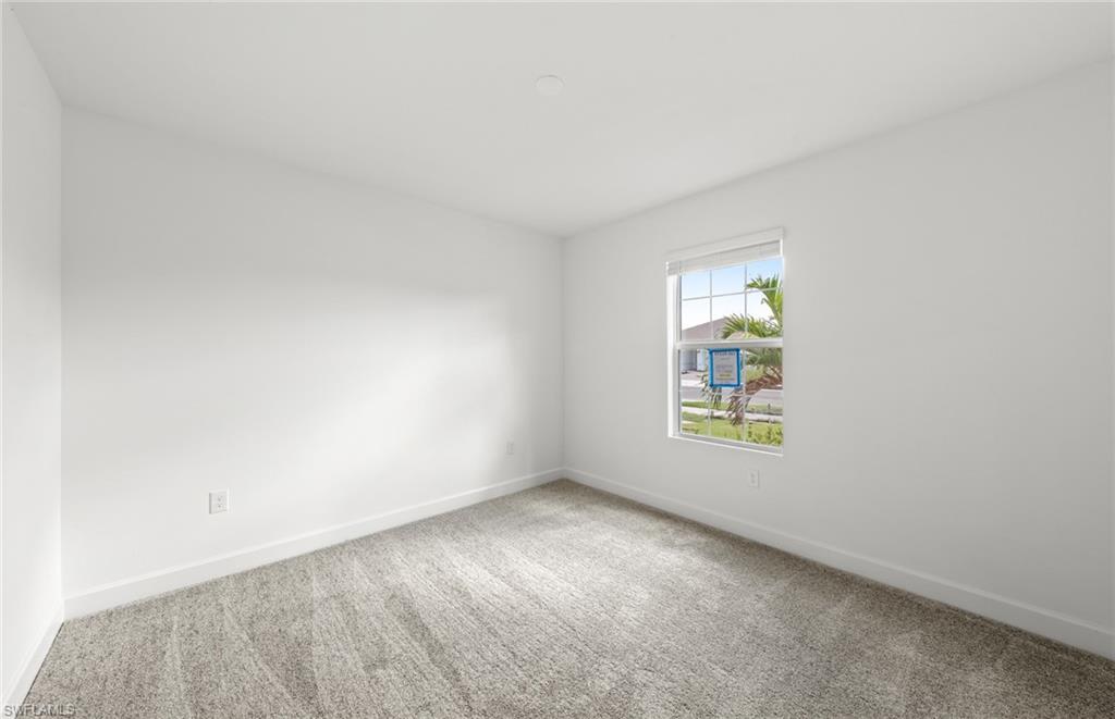 15827 Northridge Road Punta Gorda, FL 33982 - Photo 18 of 27 an empty room with windows