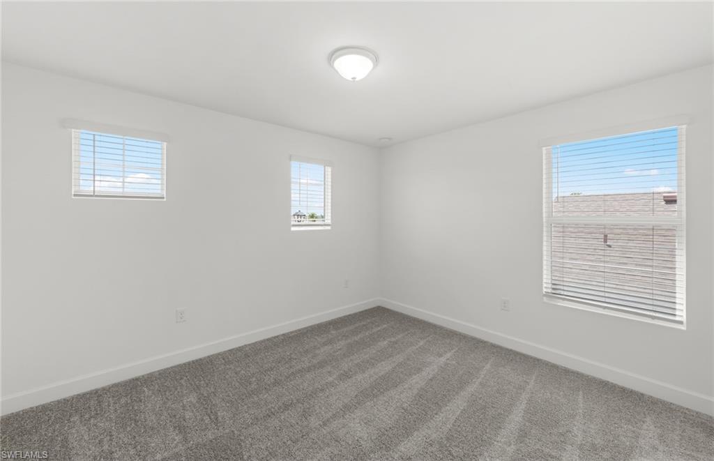 15827 Northridge Road Punta Gorda, FL 33982 - Photo 20 of 27 an empty room with a window