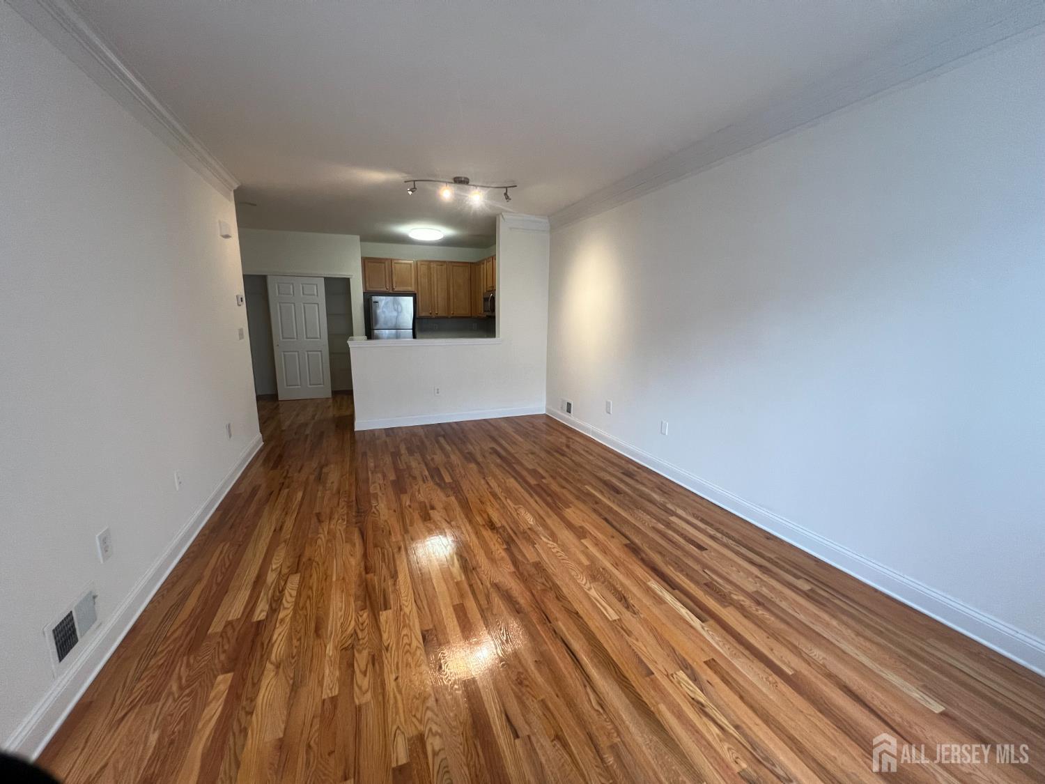 17 Burdak Road Sayreville, NJ 08859 - Photo 3 of 19 a view of a room with wooden floor