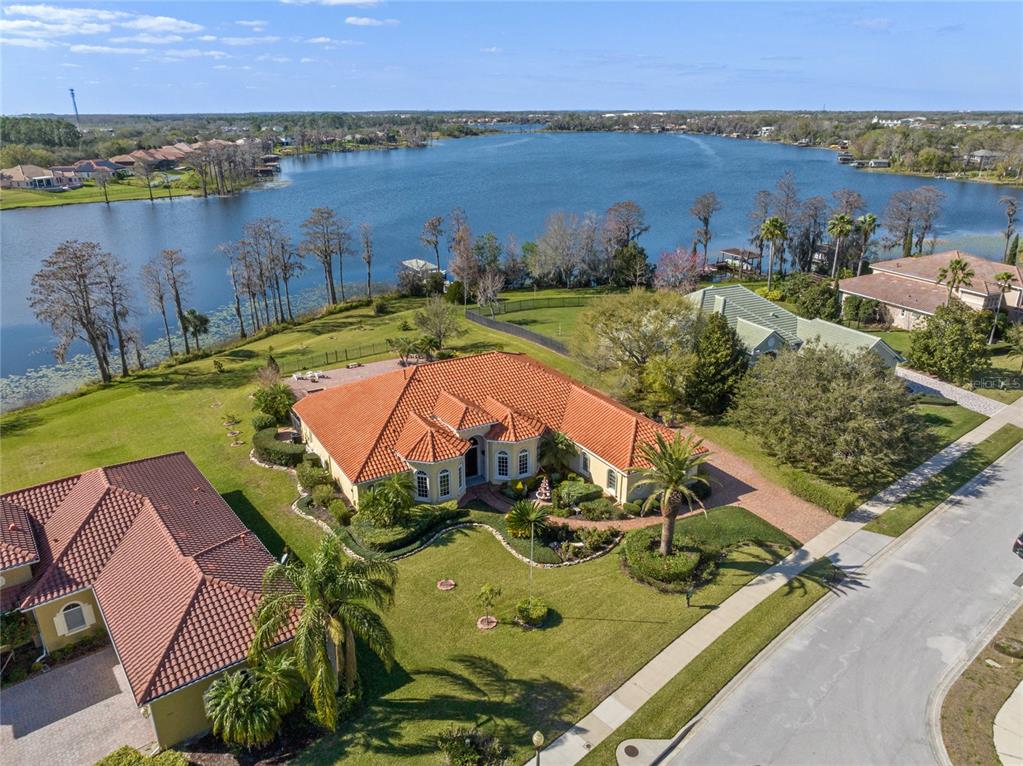 6869 Thornhill Circle Windermere, FL 34786 - Photo 1 of 1 an aerial view of a house with a lake view