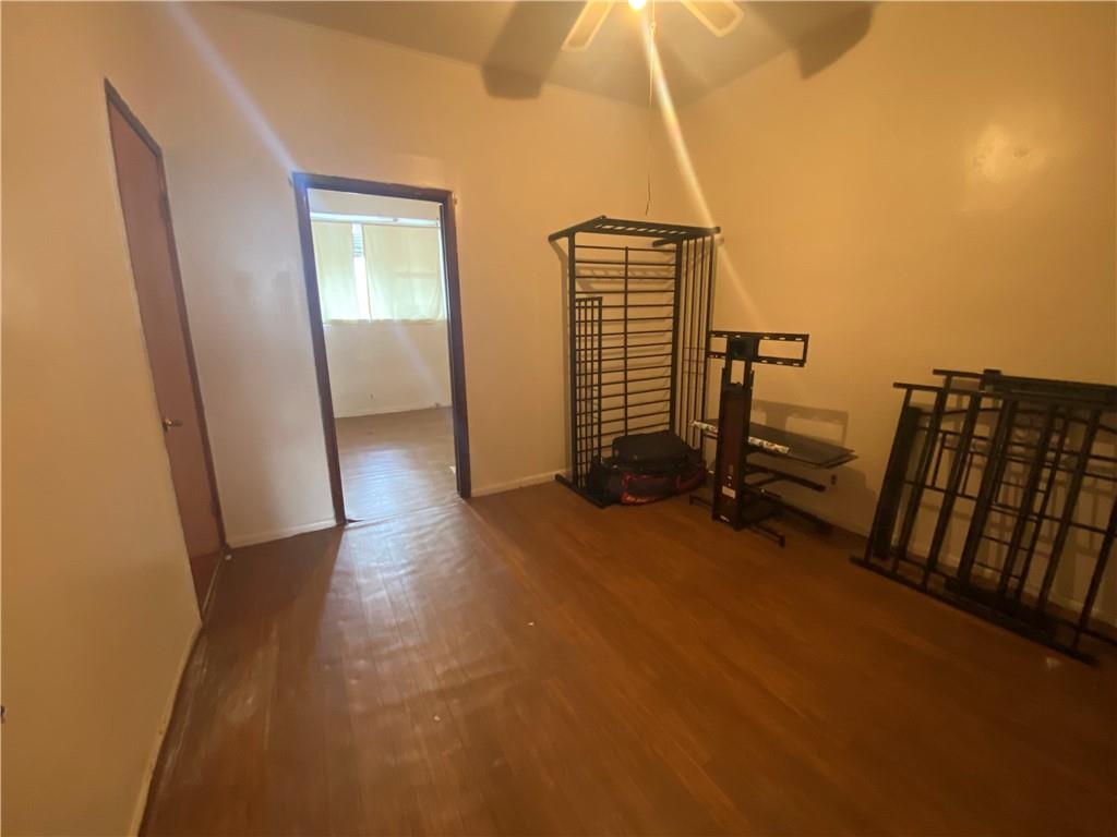 2308 Bath Avenue Brooklyn, NY 11214 - Photo 11 of 14 a view of hallway with stairs
