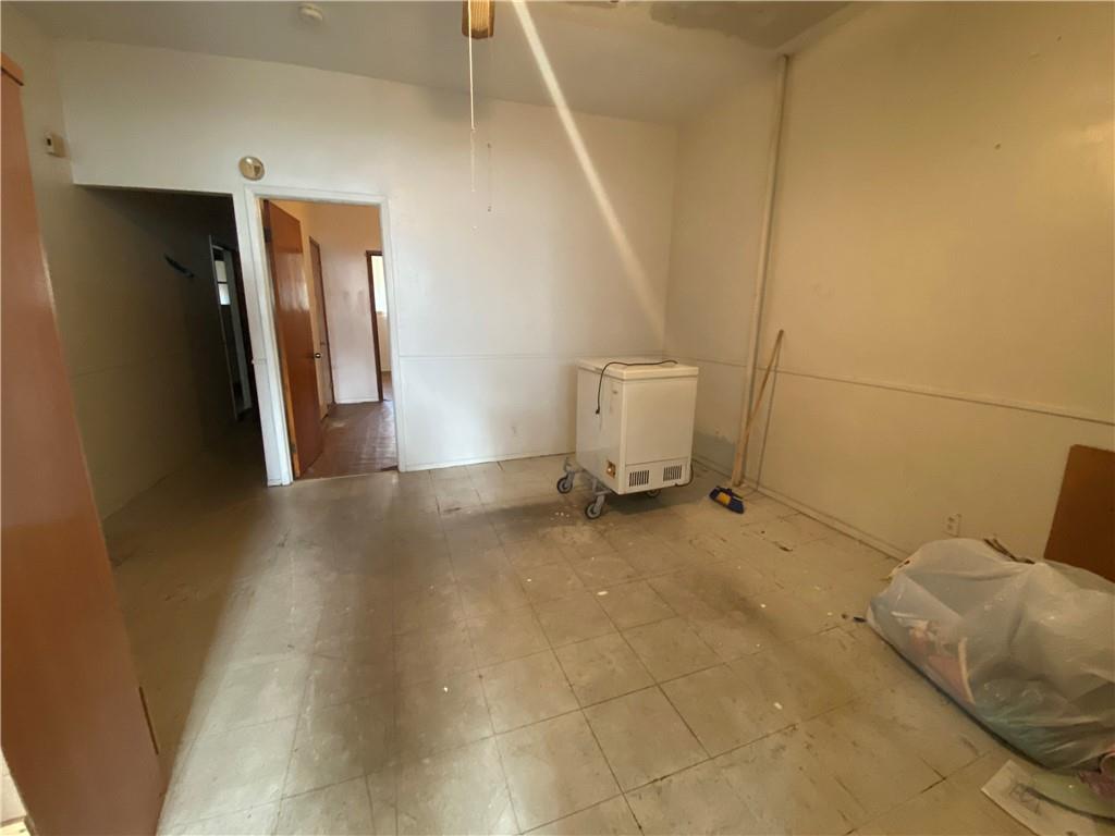 2308 Bath Avenue Brooklyn, NY 11214 - Photo 5 of 14 a view of a livingroom with furniture and staircase