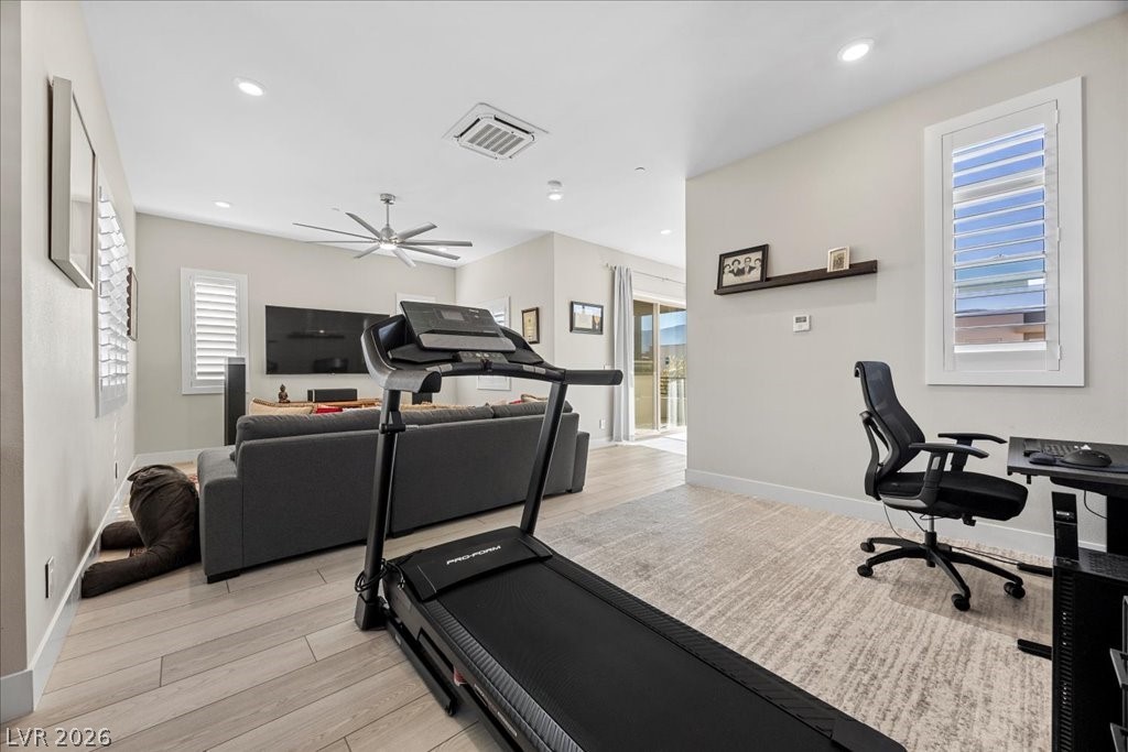 4262 Swift Street Las Vegas, NV 89135 - Photo 50 of 75 Exercise room with light wood finished floors, cooling unit, recessed lighting, and ceiling fan