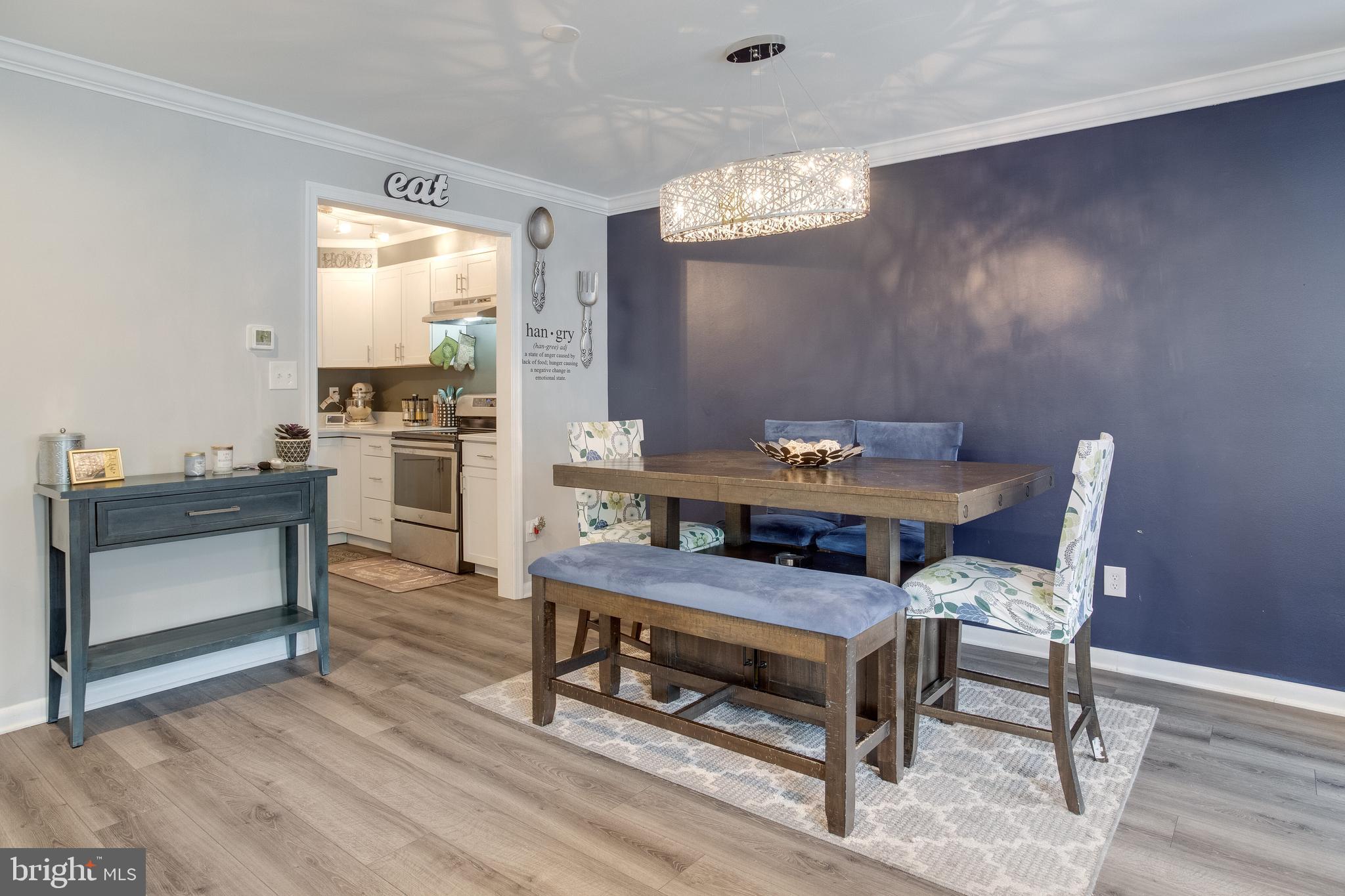 11457 Appledowre Way, Unit 2 Germantown, MD 20876 - Photo 13 of 35 Dining Area w/updated fixture and flooring