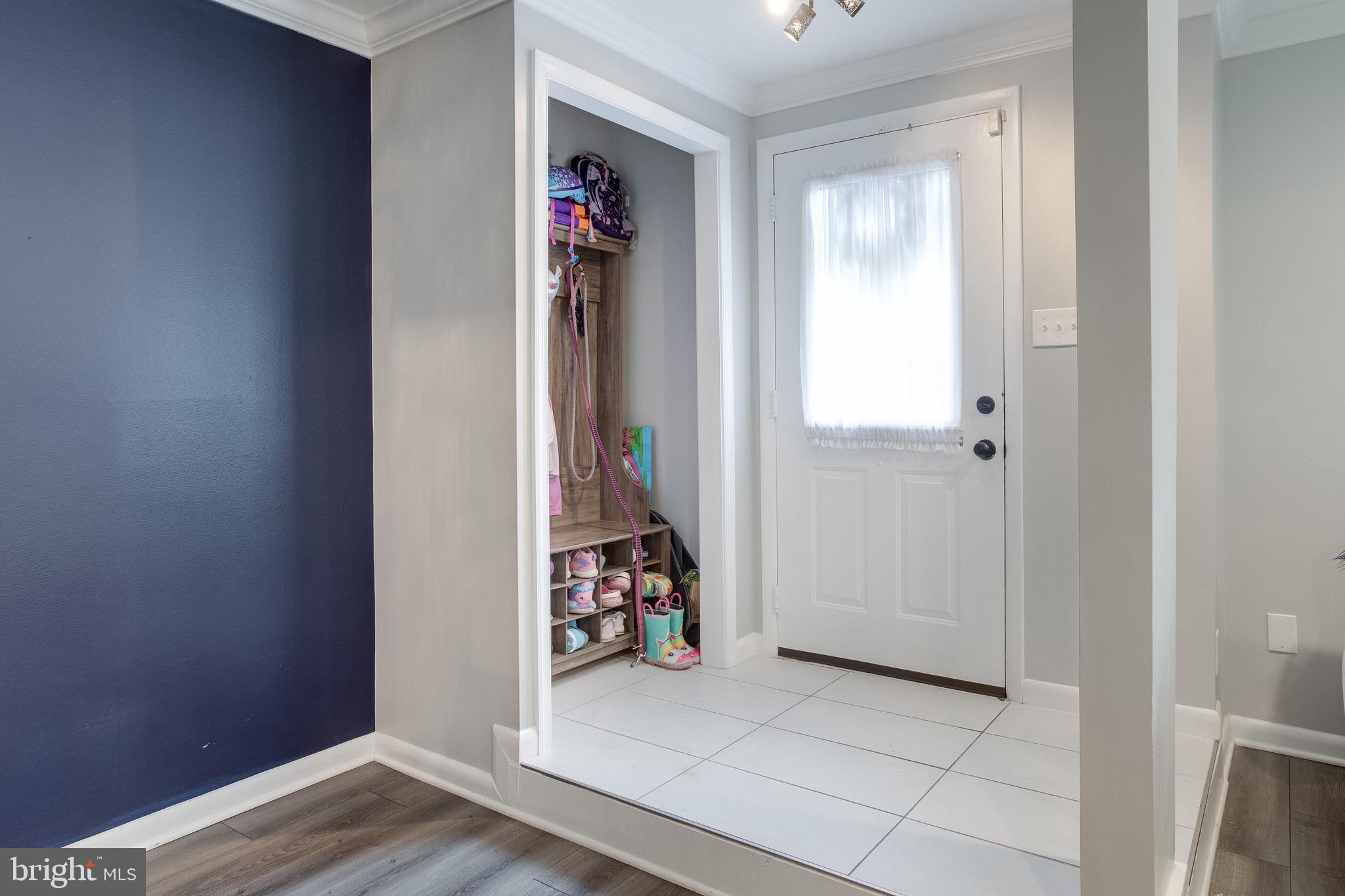 11457 Appledowre Way, Unit 2 Germantown, MD 20876 - Photo 7 of 35 Foyer w/coat/storage