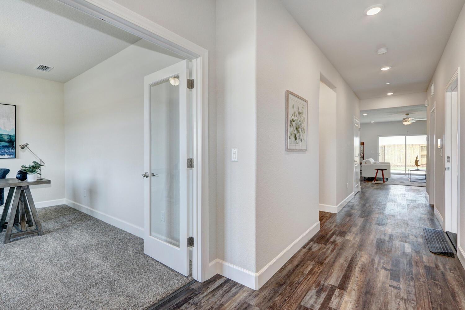 937 Norman Road Galt, CA 95632 - Photo 3 of 15 a view of hallway with wooden floor