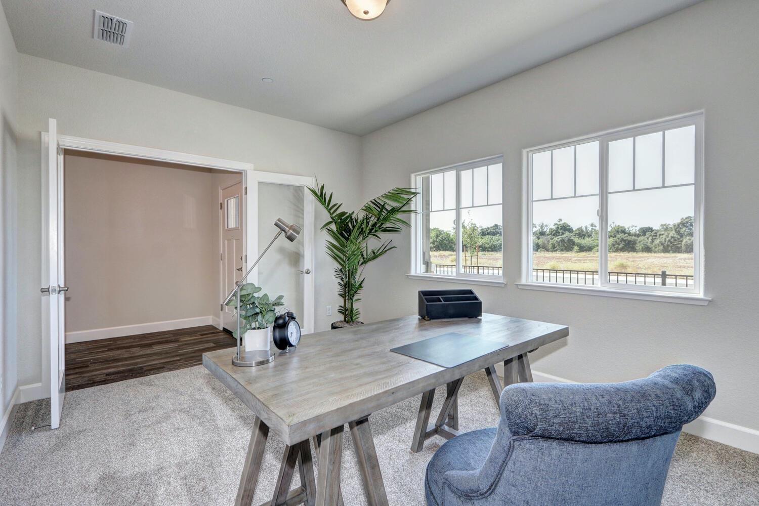 937 Norman Road Galt, CA 95632 - Photo 4 of 15 a workspace with furniture and window