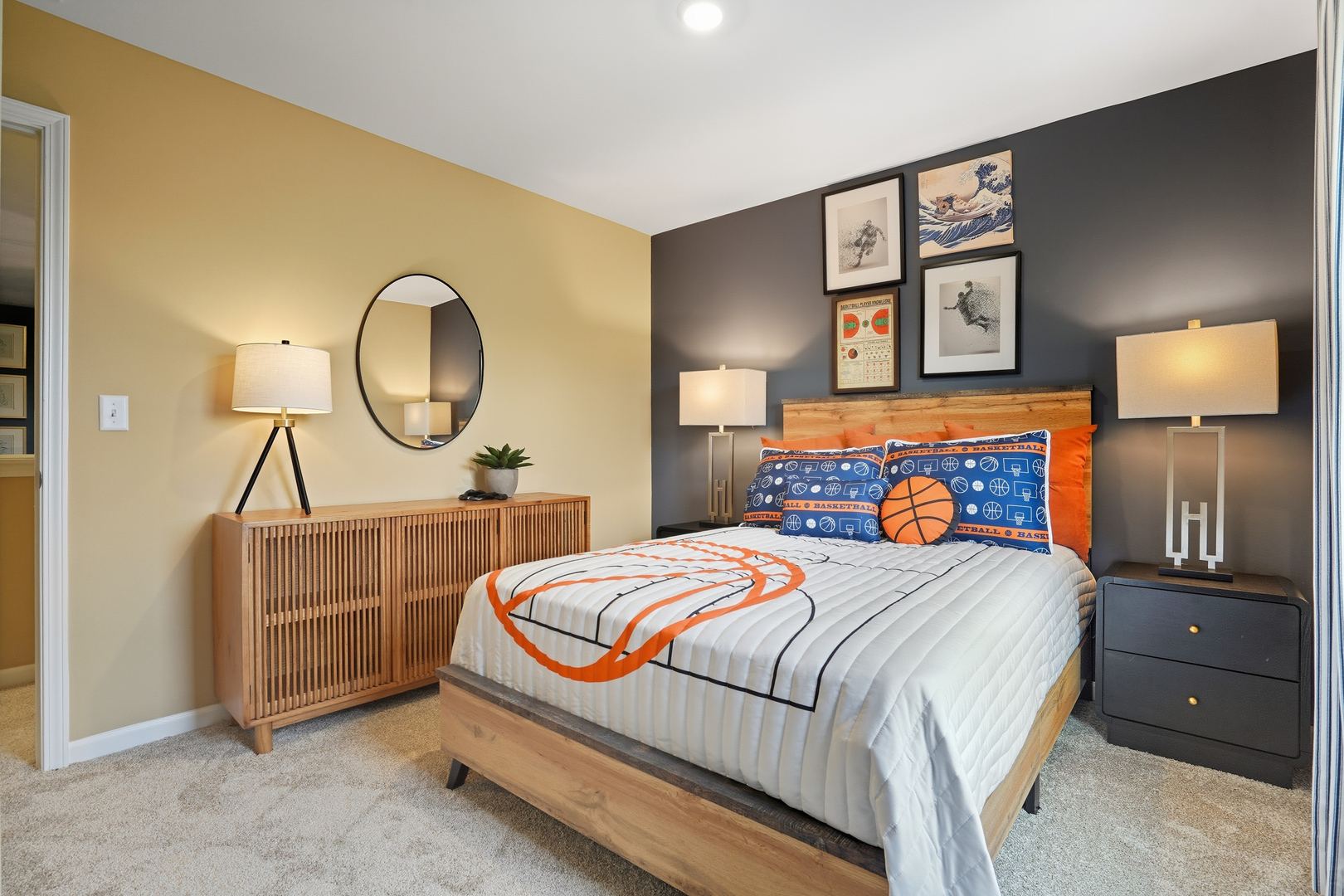 3859 Meadowridge Road Woodstock, IL 60098 - Photo 12 of 20 a bedroom with a bed a mirror on dresser and a chandelier