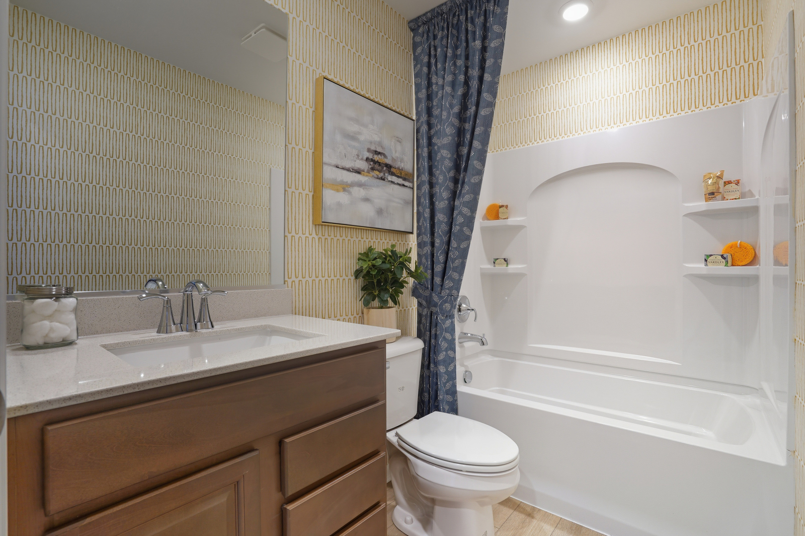 3859 Meadowridge Road Woodstock, IL 60098 - Photo 16 of 20 a bathroom with a sink toilet and shower