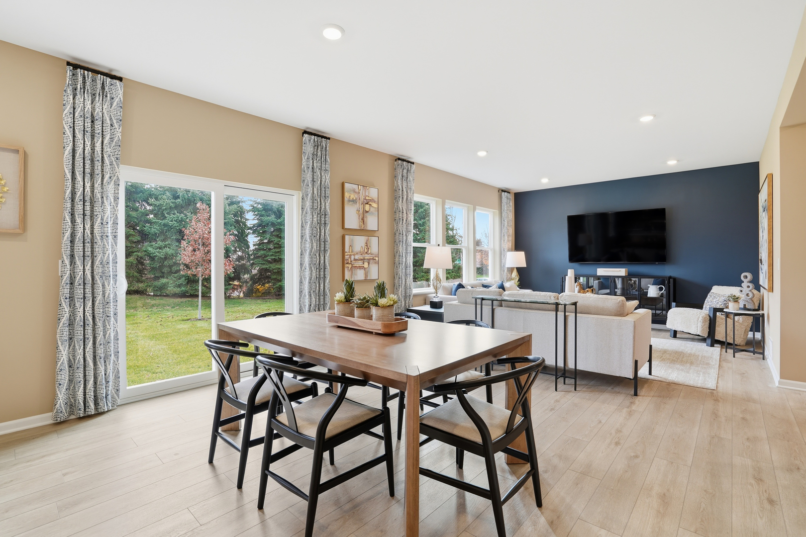 3859 Meadowridge Road Woodstock, IL 60098 - Photo 7 of 20 a view of a dining room with furniture window and wooden floor