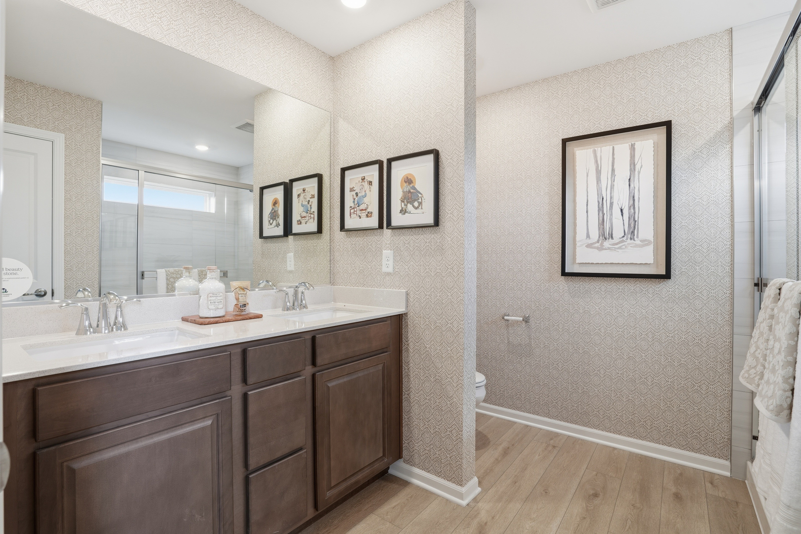 3859 Meadowridge Road Woodstock, IL 60098 - Photo 10 of 20 a bathroom with a double vanity sink and a mirror