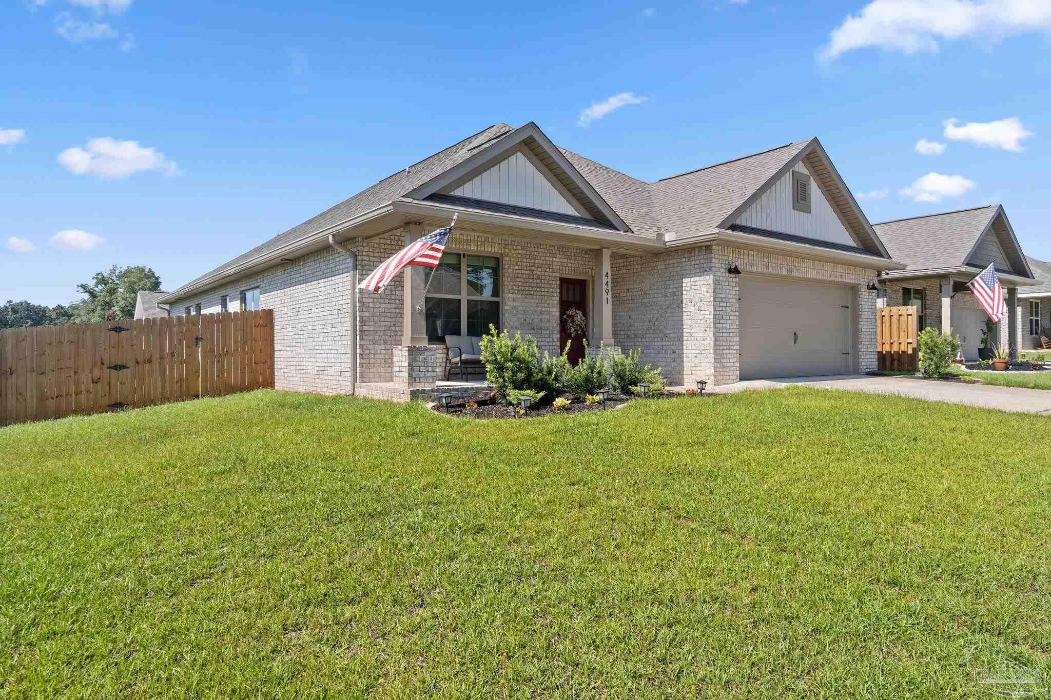 4491 Jude Way Pace, FL 32571 - Photo 2 of 36 Large corner lot with cozy porch