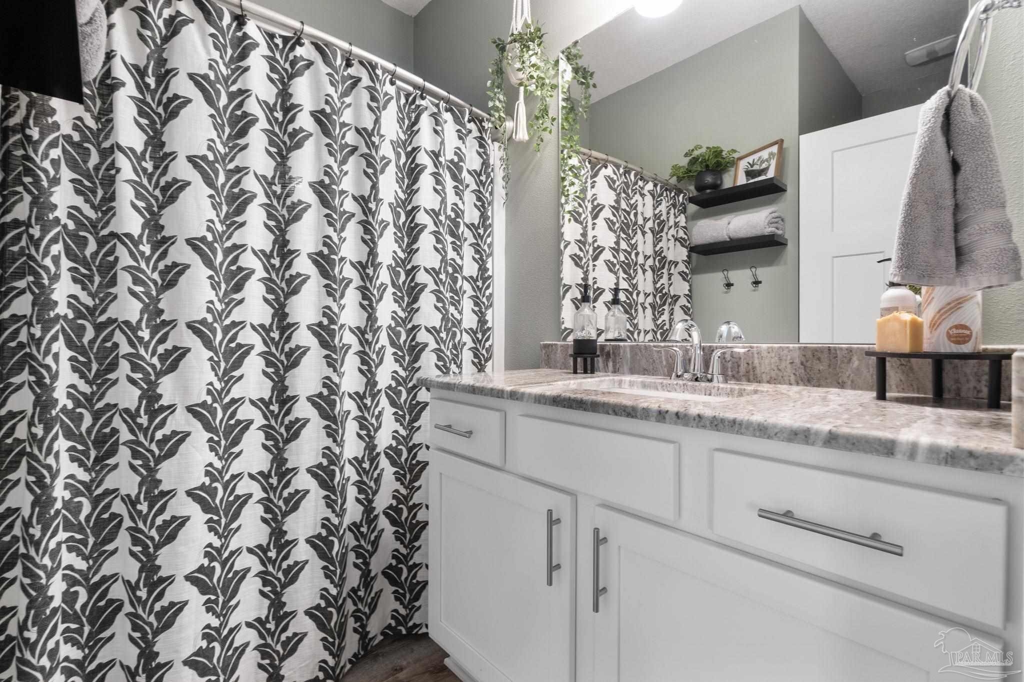 4491 Jude Way Pace, FL 32571 - Photo 25 of 36 granite counters, tub/shower combo