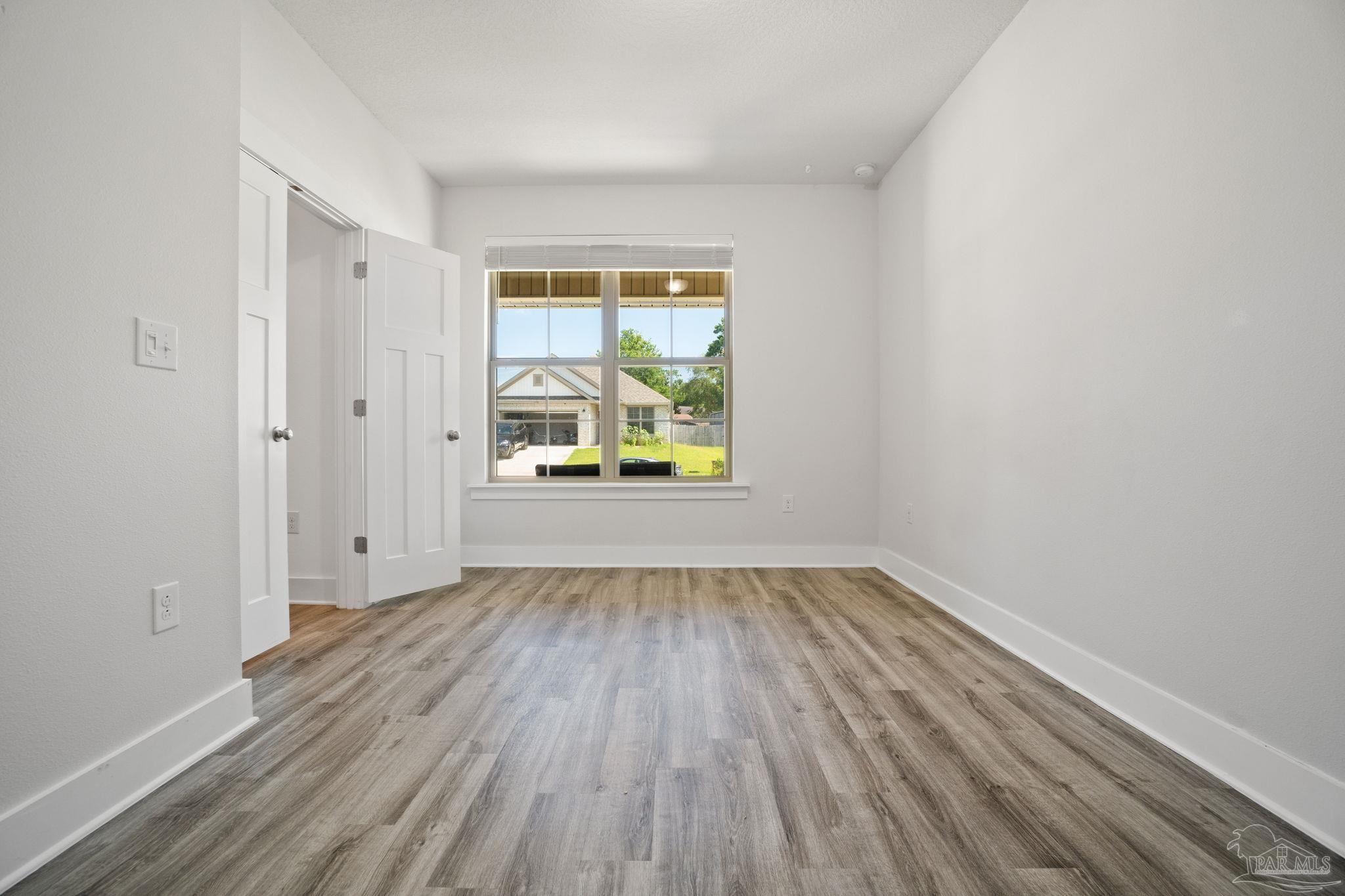 4491 Jude Way Pace, FL 32571 - Photo 28 of 36 French doors separate office from main foyer