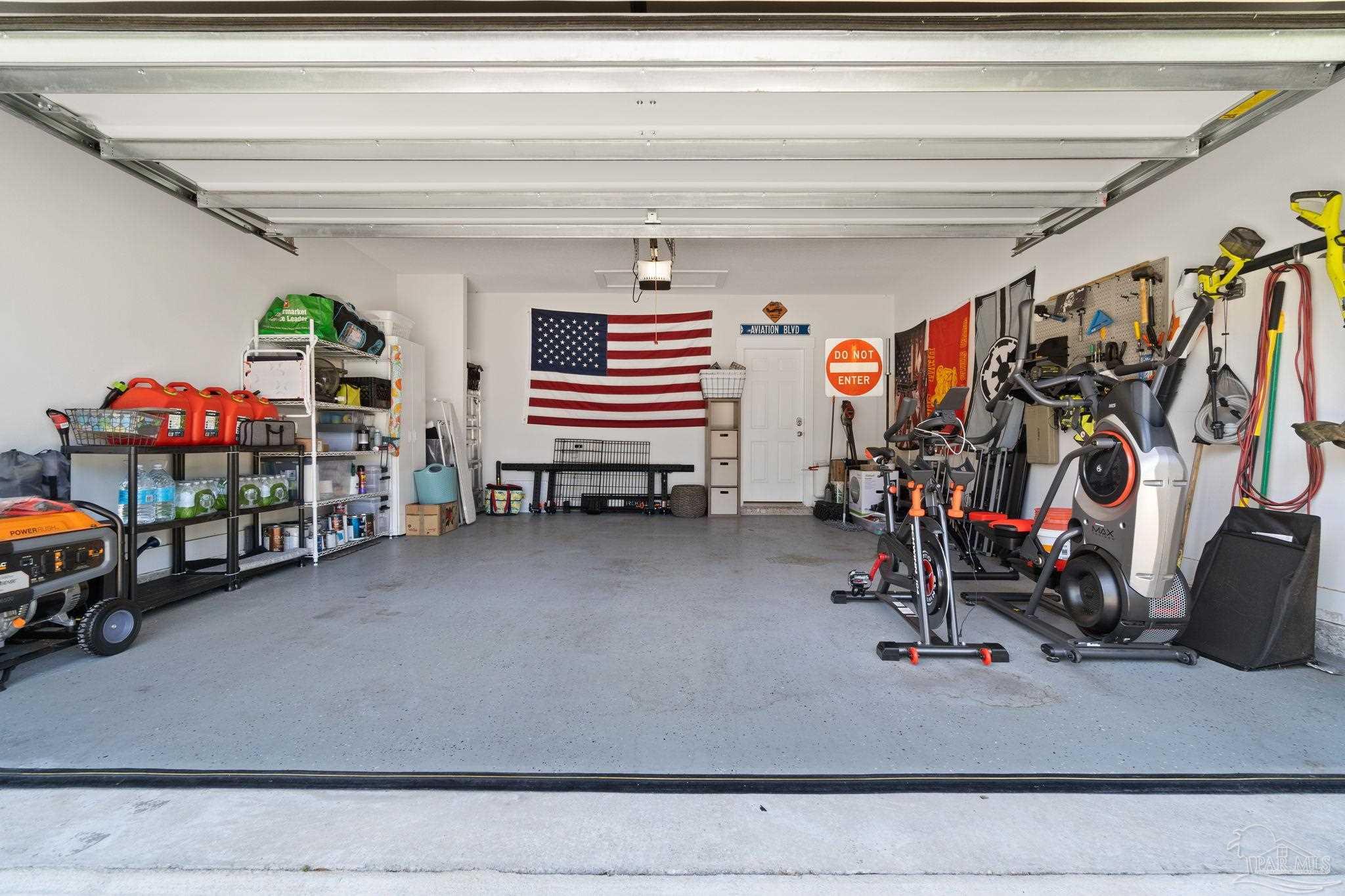 4491 Jude Way Pace, FL 32571 - Photo 31 of 36 2 car garage, epoxy floor treatment