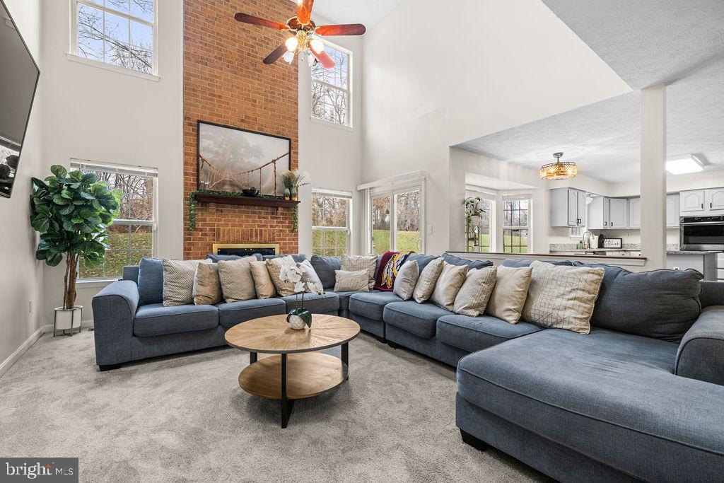 9803 Bald Hill Road Bowie, MD 20721 - Photo 2 of 55 a living room with furniture and a large window