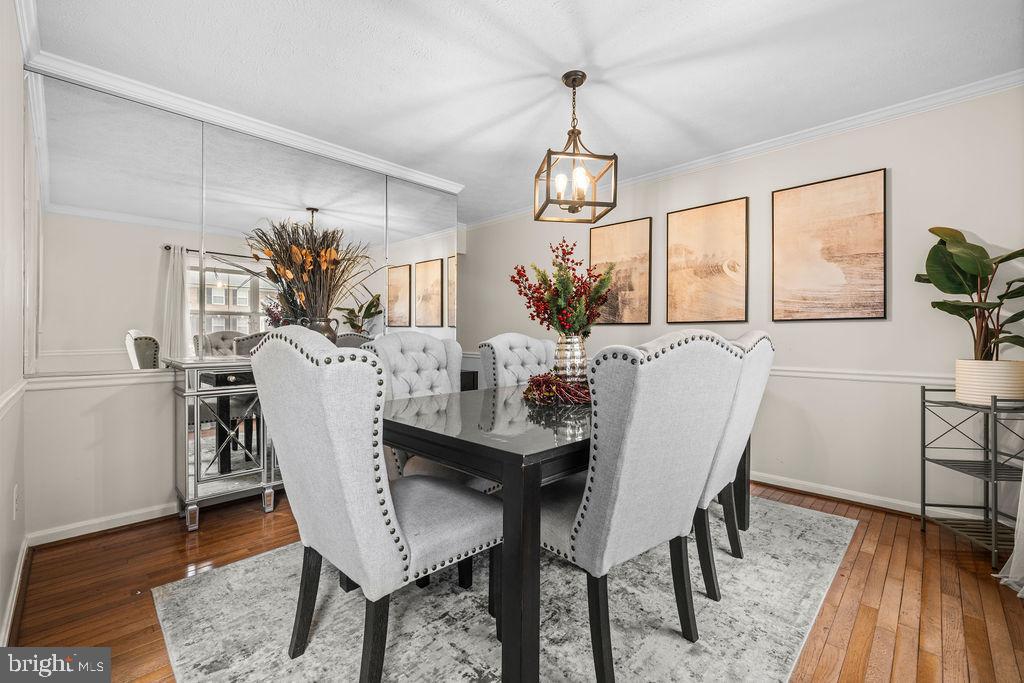 9803 Bald Hill Road Bowie, MD 20721 - Photo 3 of 55 a view of a dining room with furniture window and wooden floor