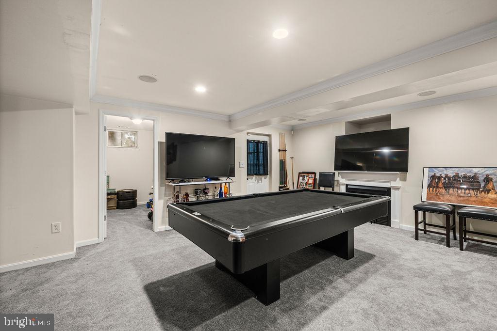 9803 Bald Hill Road Bowie, MD 20721 - Photo 39 of 55 a living room with furniture and a flat screen tv