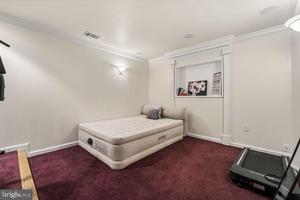 9803 Bald Hill Road Bowie, MD 20721 - Photo 47 of 55 a room with a bed and window