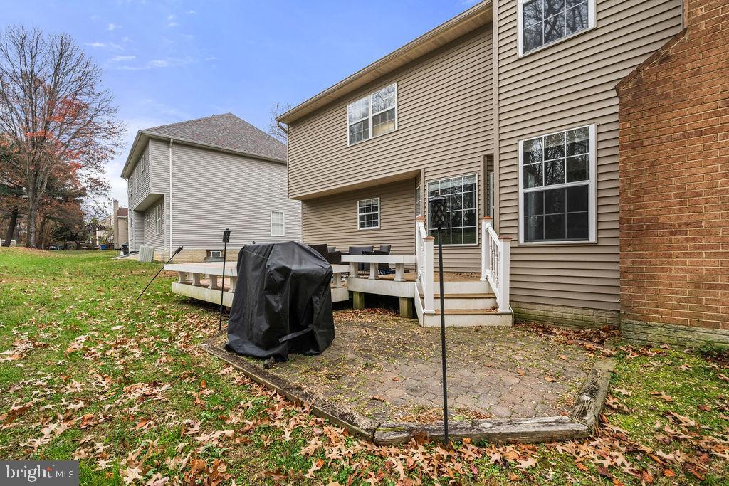 9803 Bald Hill Road Bowie, MD 20721 - Photo 51 of 55 a backyard of a house with barbeque oven