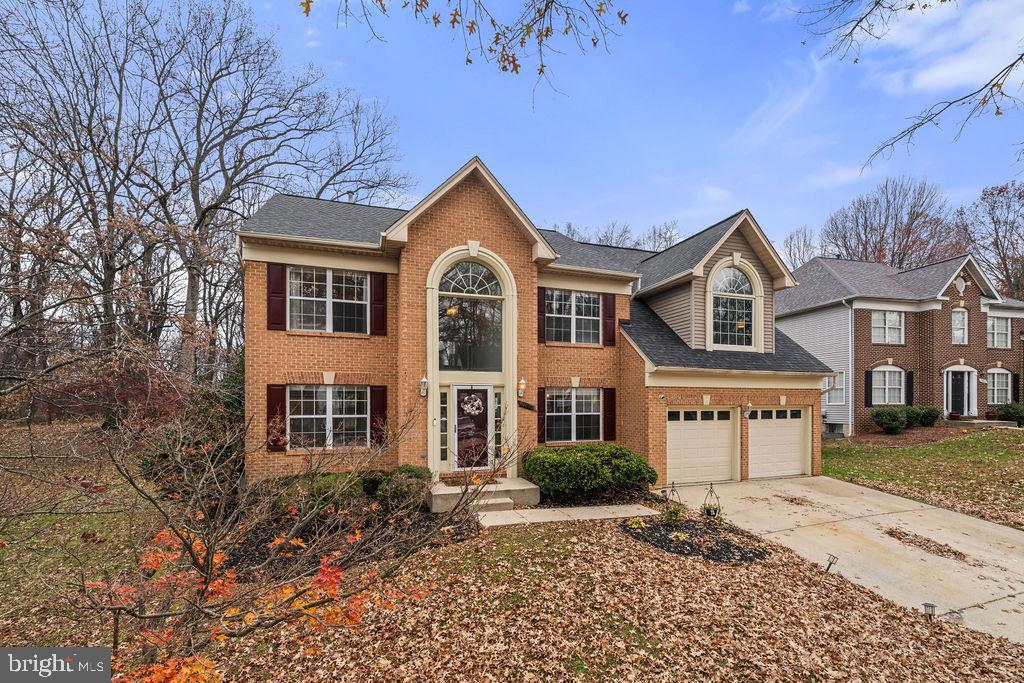 9803 Bald Hill Road Bowie, MD 20721 - Photo 53 of 55 a front view of a house with a yard
