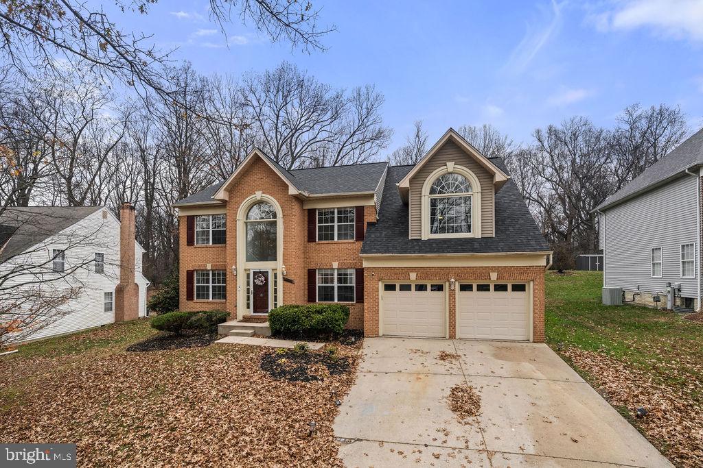 9803 Bald Hill Road Bowie, MD 20721 - Photo 54 of 55 a front view of a house with garden