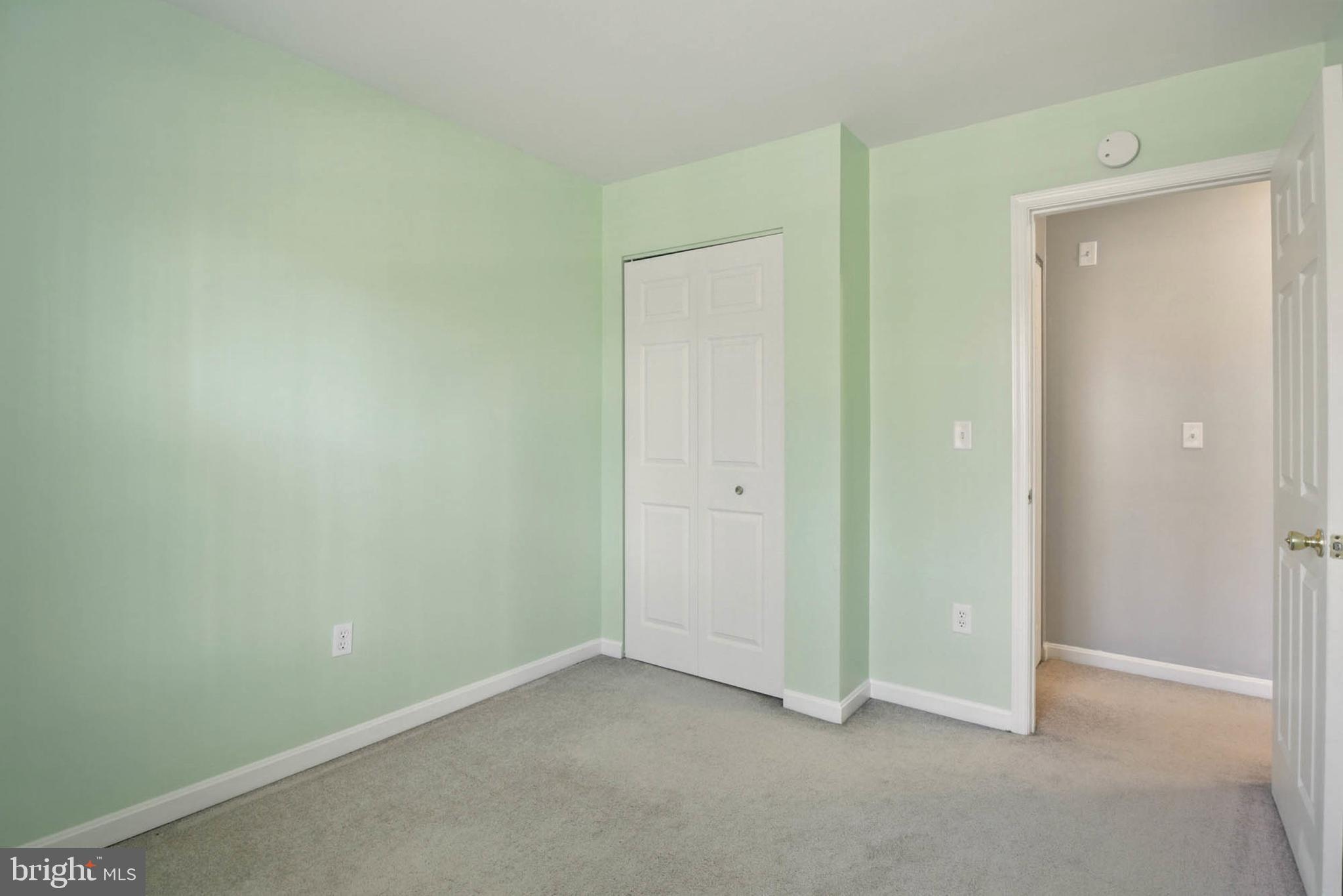 7812 Solari Court Pasadena, MD 21122 - Photo 14 of 30 an empty room with closet area