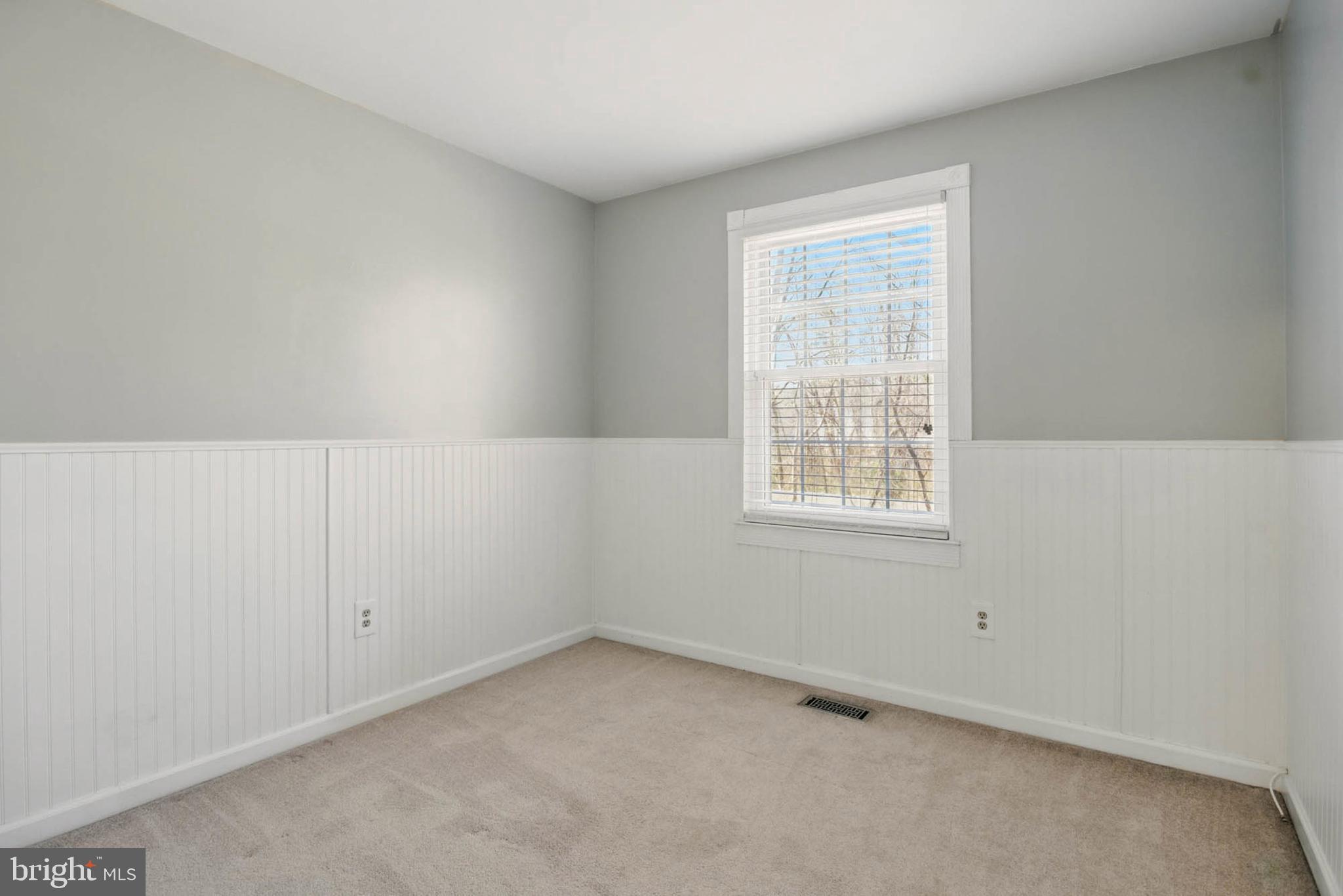 7812 Solari Court Pasadena, MD 21122 - Photo 18 of 30 an empty room with a window