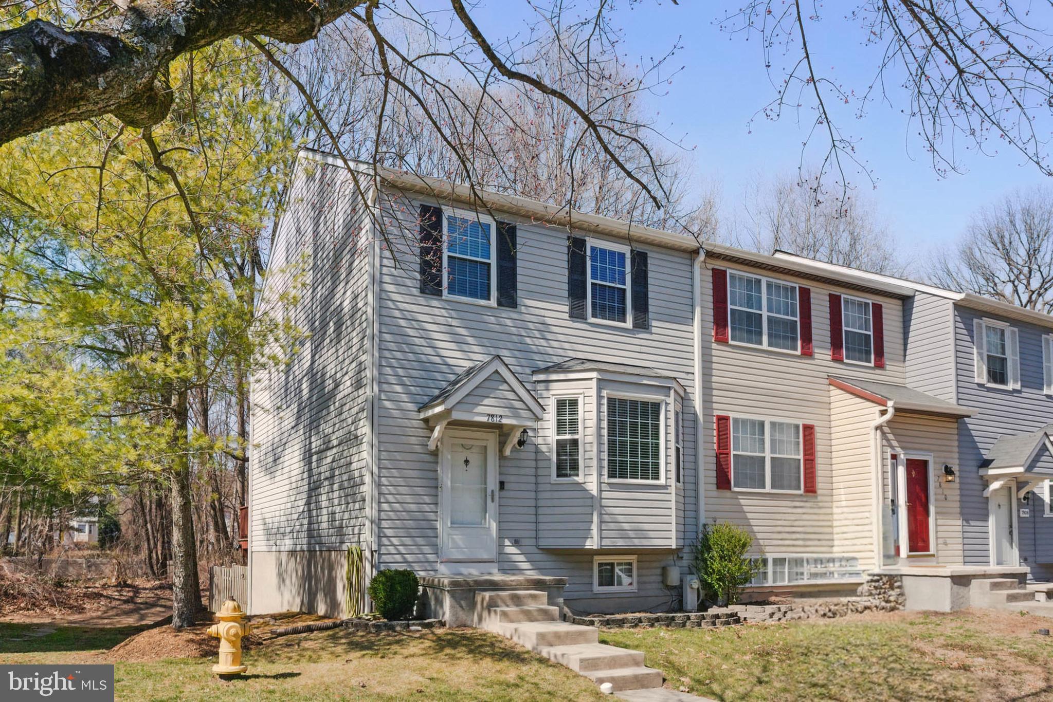 7812 Solari Court Pasadena, MD 21122 - Photo 2 of 30 a front view of a house with street