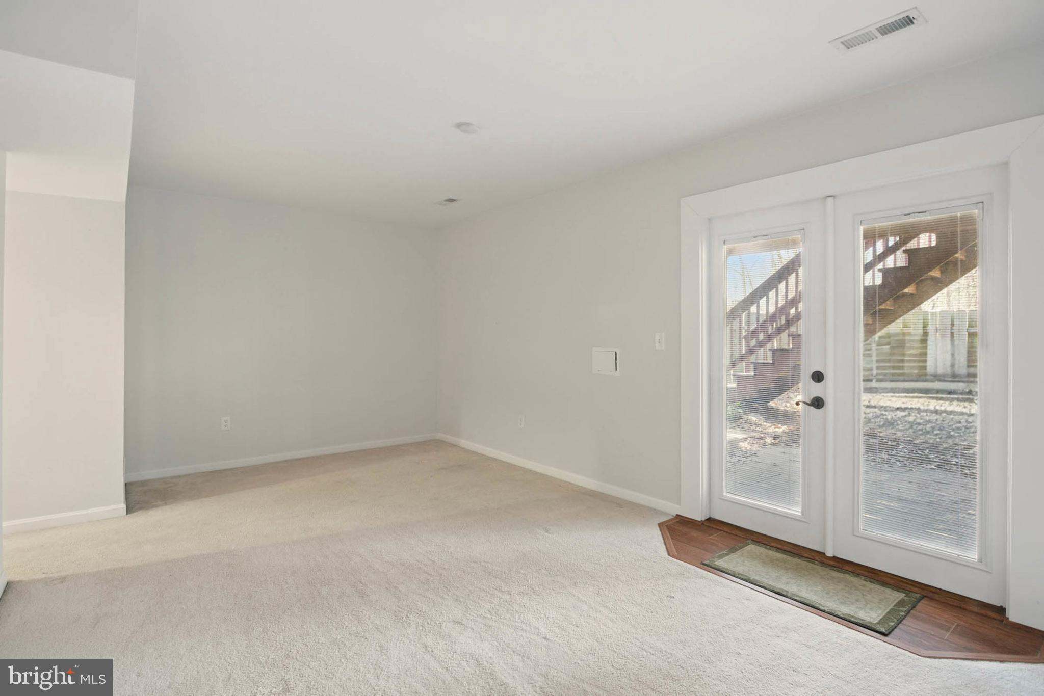 7812 Solari Court Pasadena, MD 21122 - Photo 24 of 30 an empty room with windows