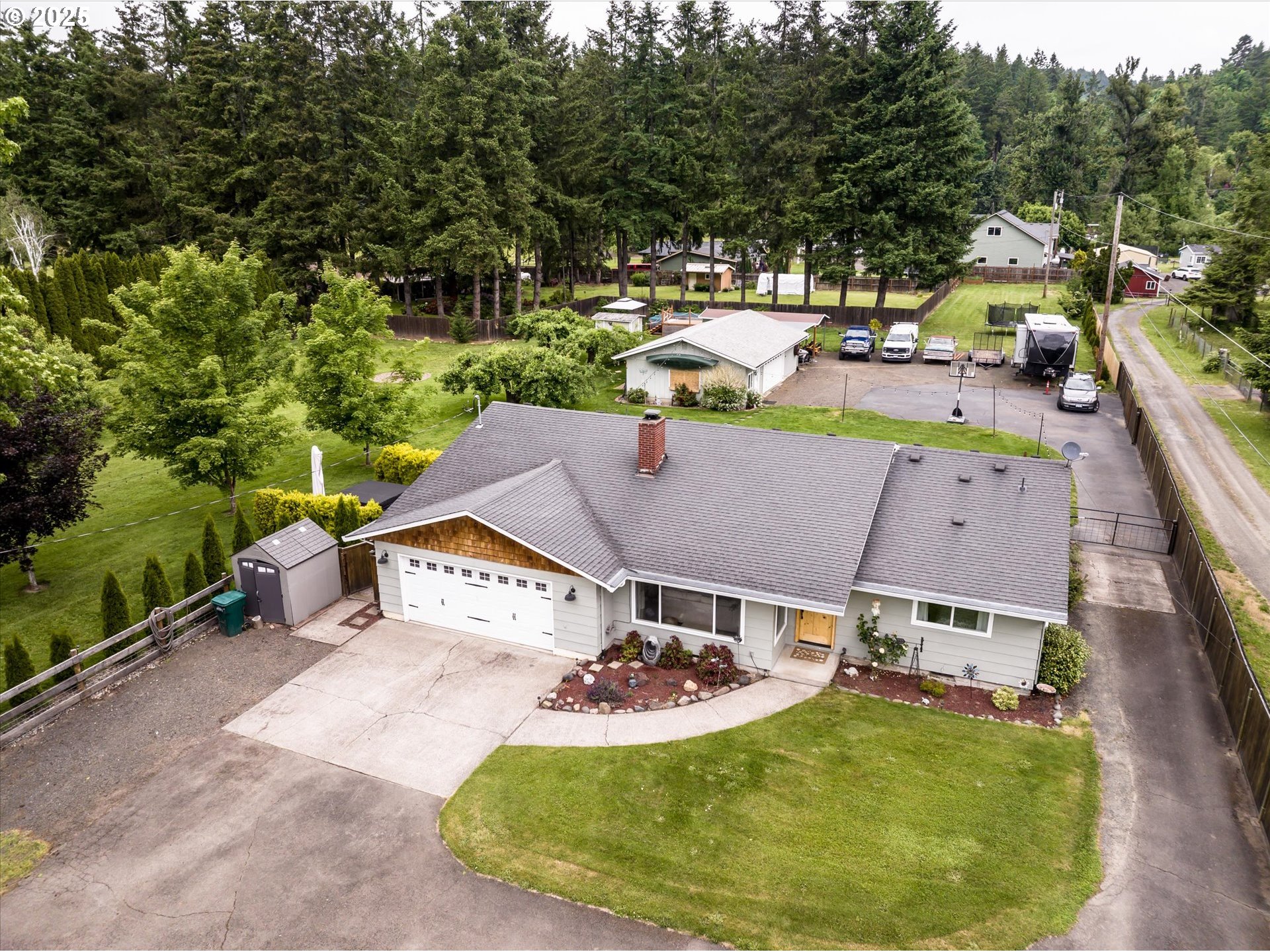 37807 Camp Creek Road Springfield, OR 97478 - Photo 1 of 40 an aerial view of a house with garden space and street view
