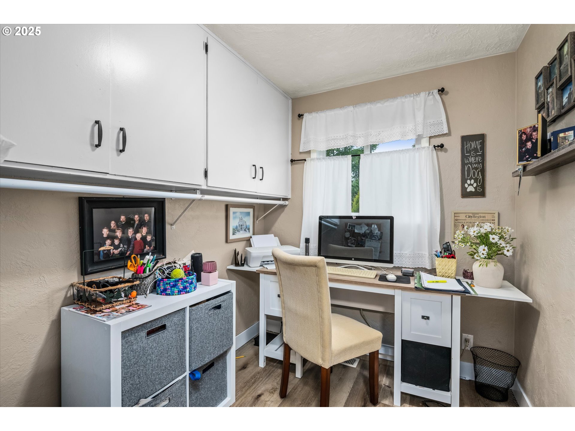 37807 Camp Creek Road Springfield, OR 97478 - Photo 17 of 40 a kitchen with stainless steel appliances kitchen island granite countertop a table chairs in it and a microwave