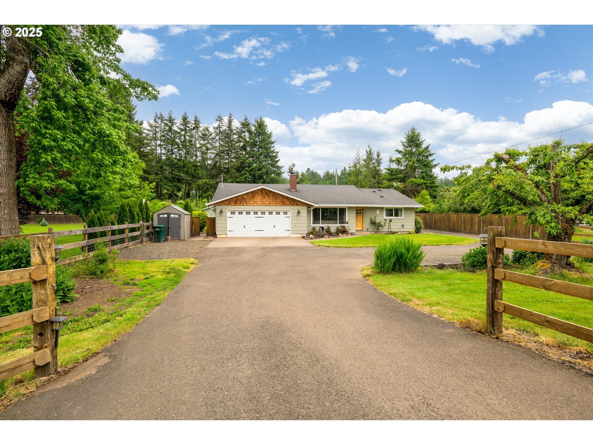 37807 Camp Creek Road Springfield, OR 97478 - Photo 2 of 40 a front view of a house with a yard