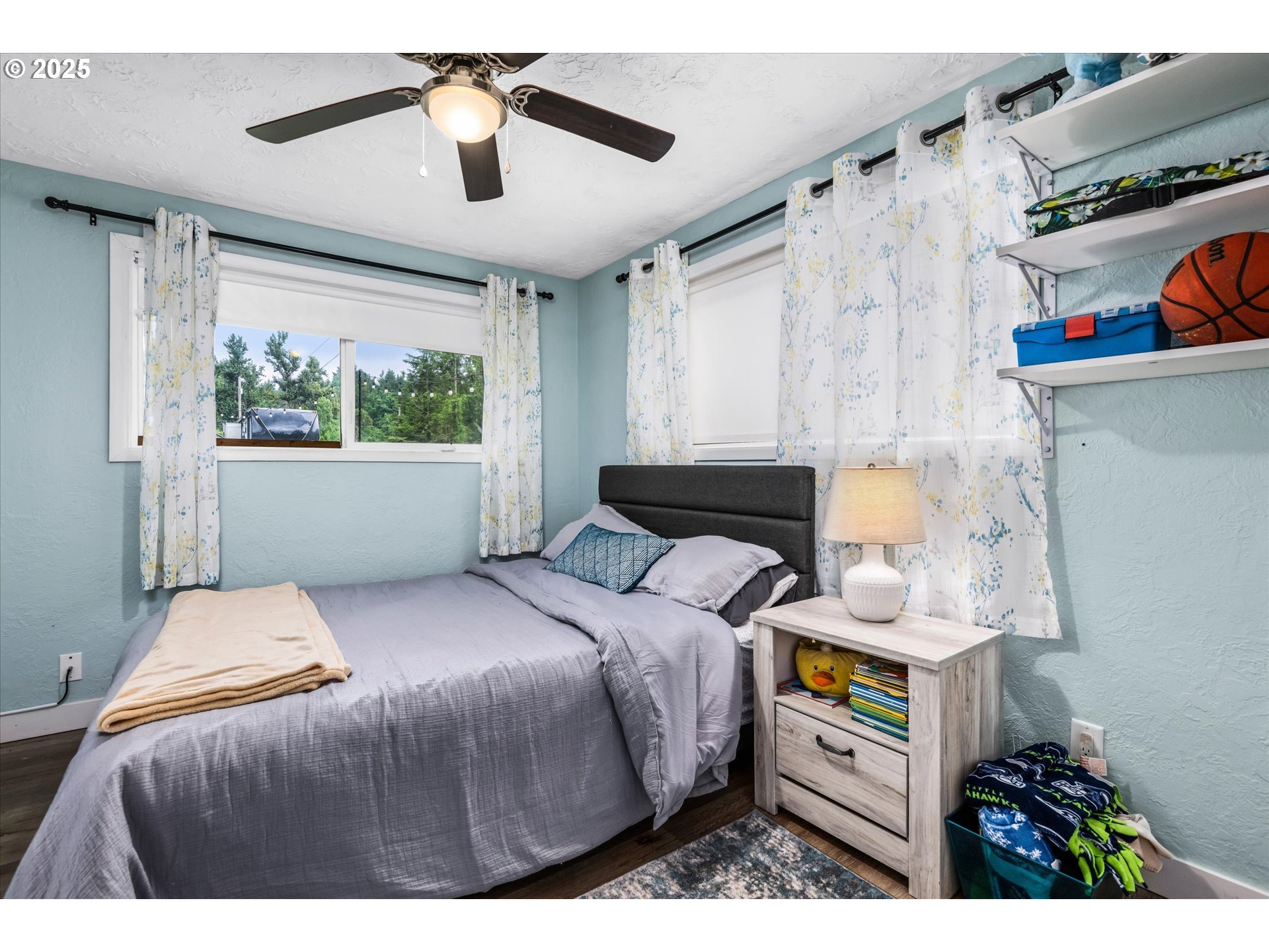 37807 Camp Creek Road Springfield, OR 97478 - Photo 23 of 40 a bedroom with a bed and a window