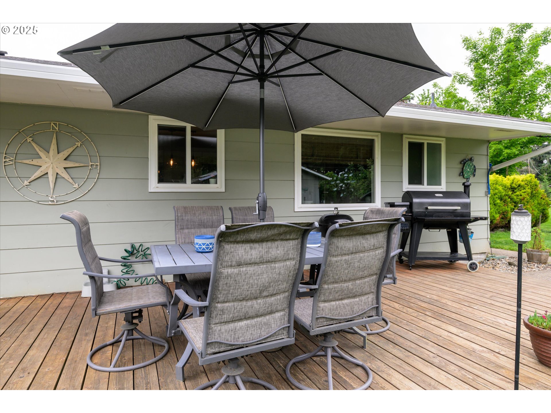 37807 Camp Creek Road Springfield, OR 97478 - Photo 29 of 40 a outdoor space with patio the couches and a potted plant